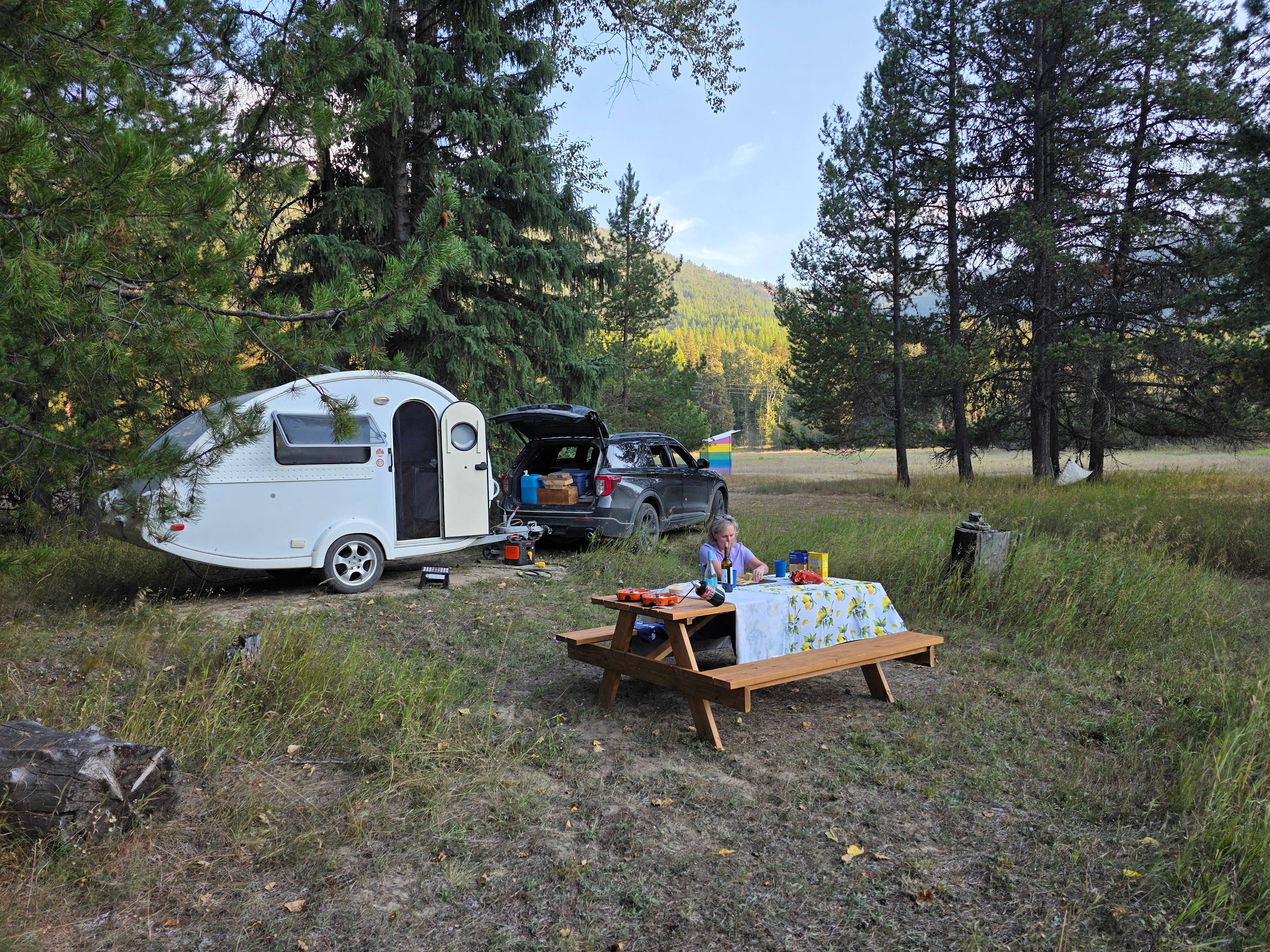 Outhouse in the background.