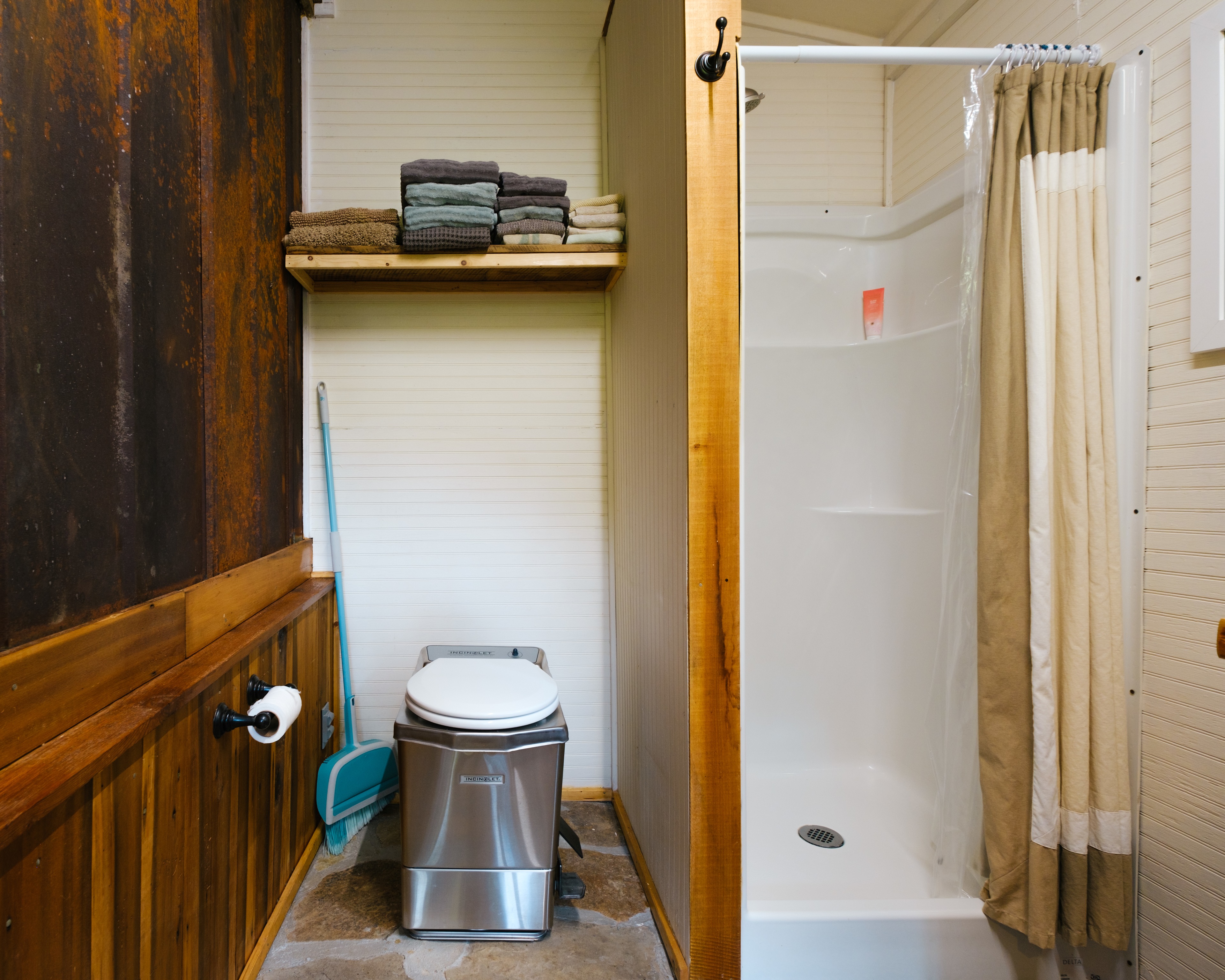 clean bathroom with toilet and shower