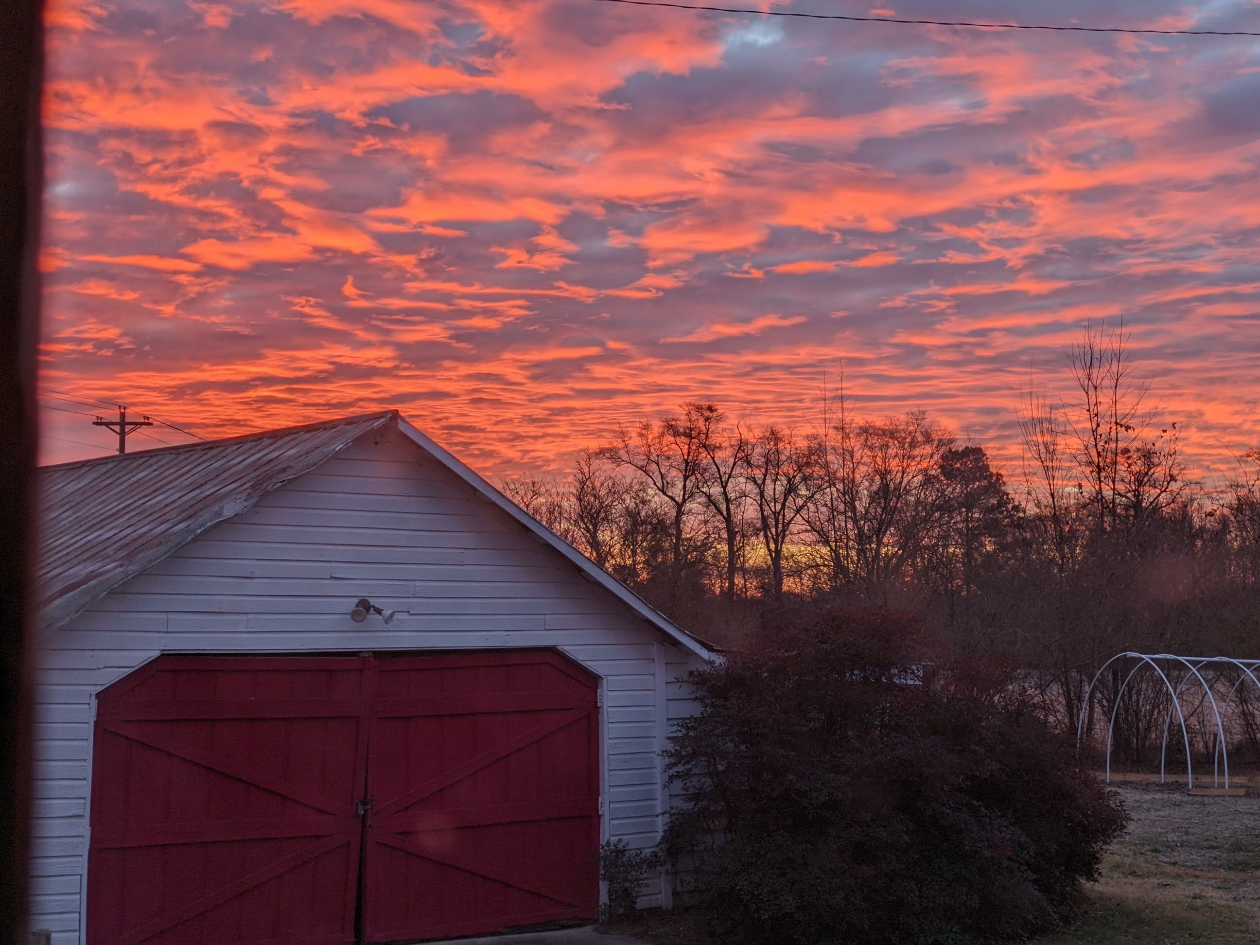 A stunning sunset over the garage