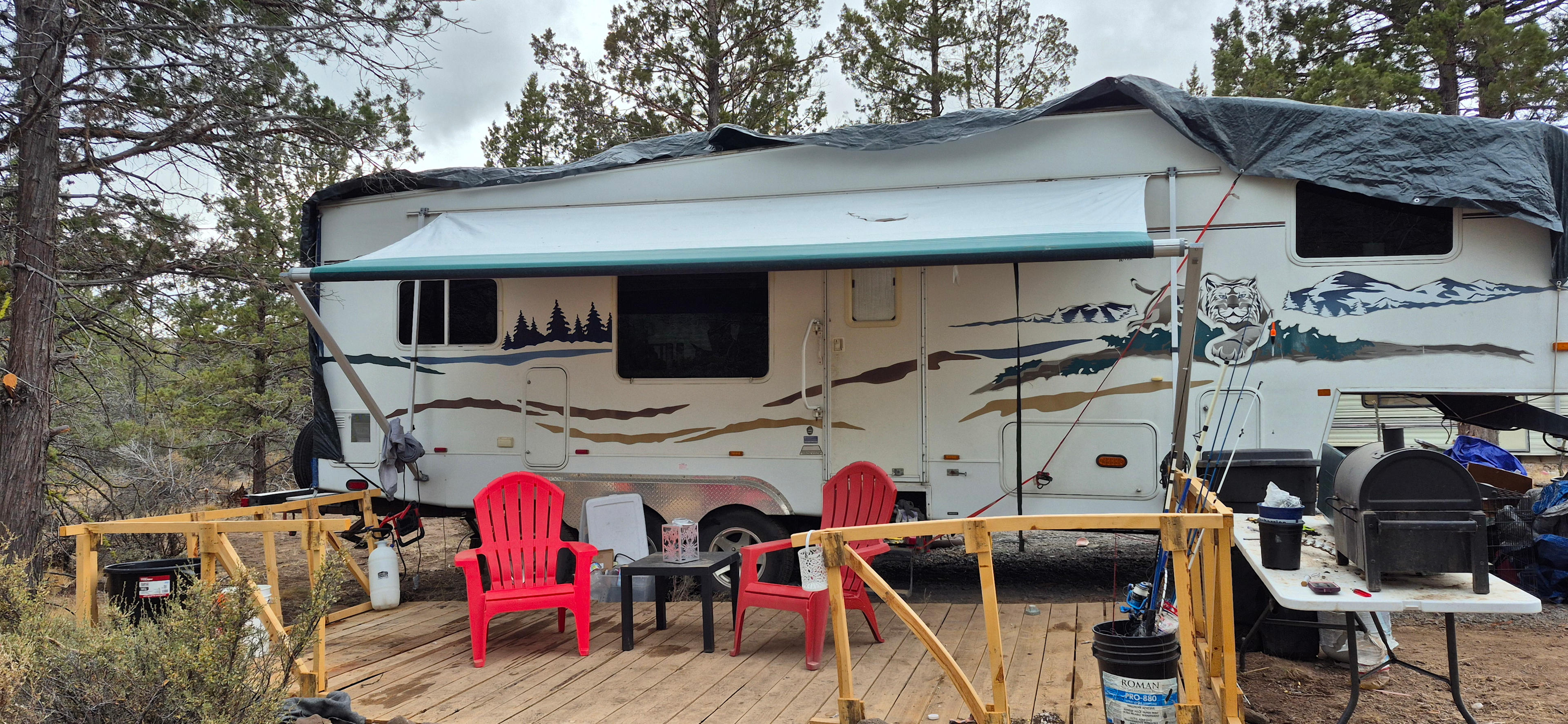 Our 2 sites are back in only, with plenty of parking around the site. Both sites can accommodate up to 30 feet long x 20 feet wide. Slides, pip out decks and toy haulers are welcome 

Site 1 has a deck with chairs and firepit ( gas fire pit is provided due to burn ban). Site 2 has fire pit and outdoor seating in its own private little meadow.  Both site come with 55 gallon water tote to tap into, trash can, seating area and generator full of gas for the entire your stay. 