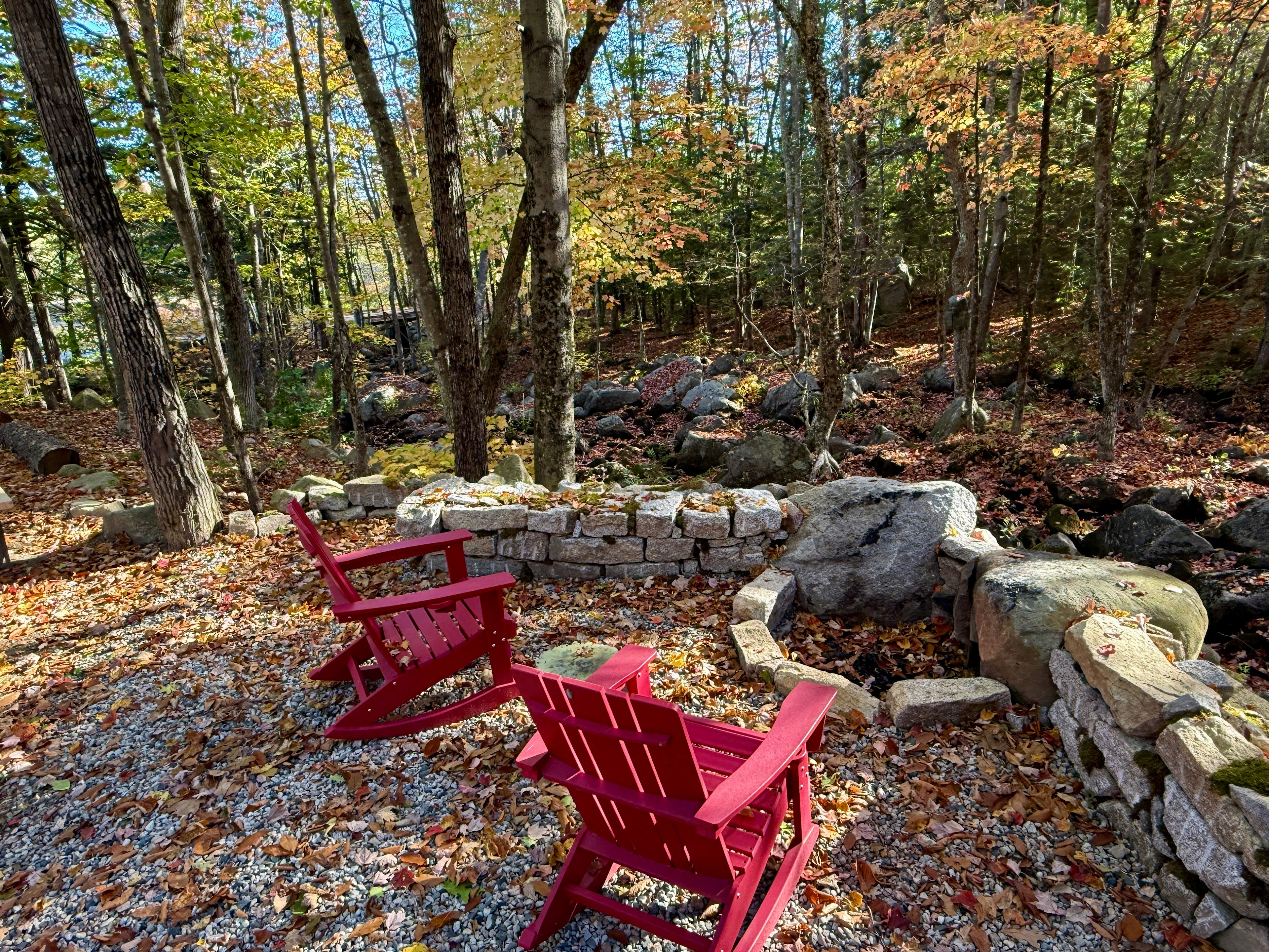 October 2025- the perfect seats on the beauty of fall. Water flows under the leaves. For now we have a state wide fire ban in NH. 