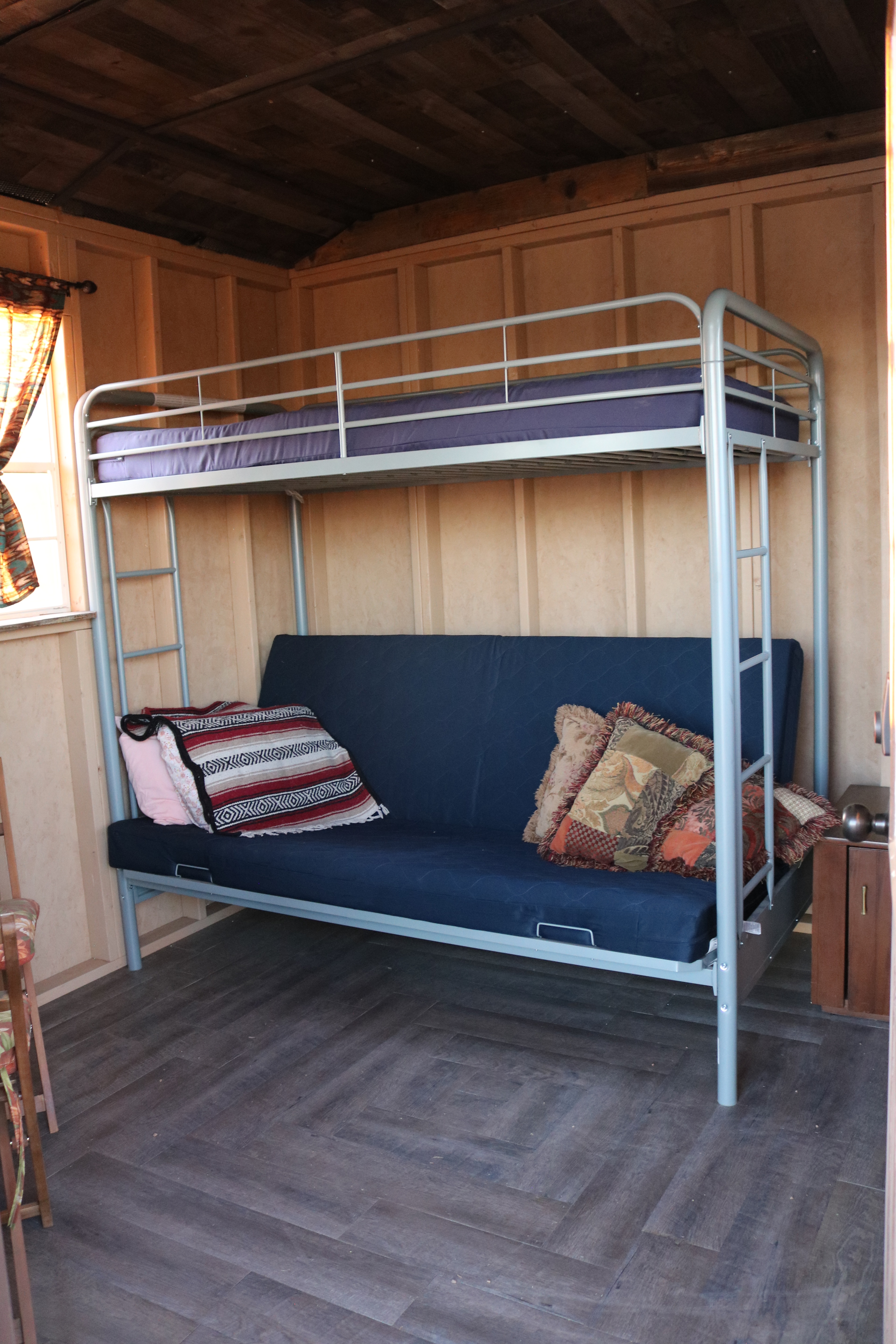 Take a peek inside The Cannonball Bunkhouse. Twin on top and a fold out full on the bottom. 