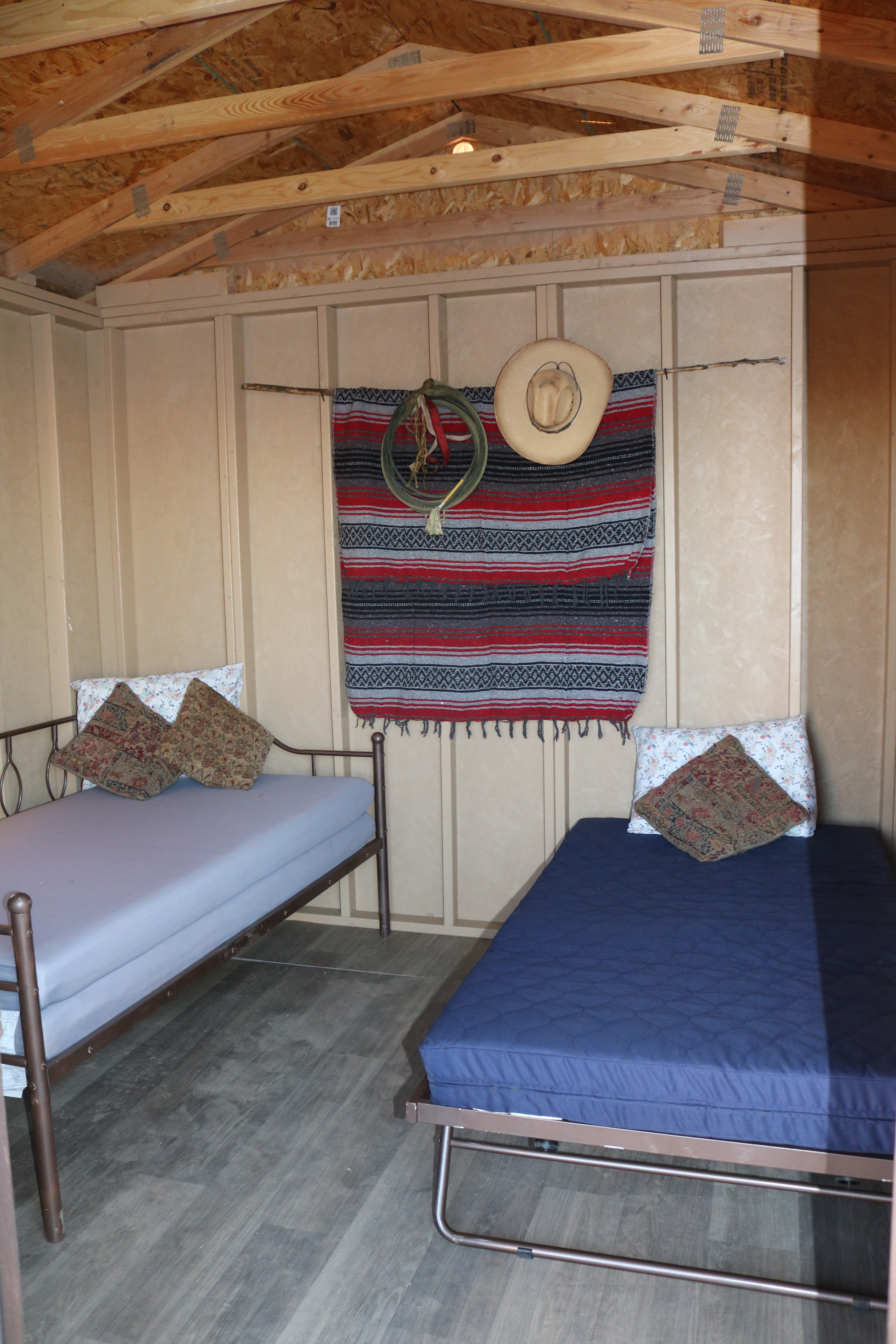 The Eastwood is beckoning you and a friend to stay the night. Two twin beds to fall asleep on. 