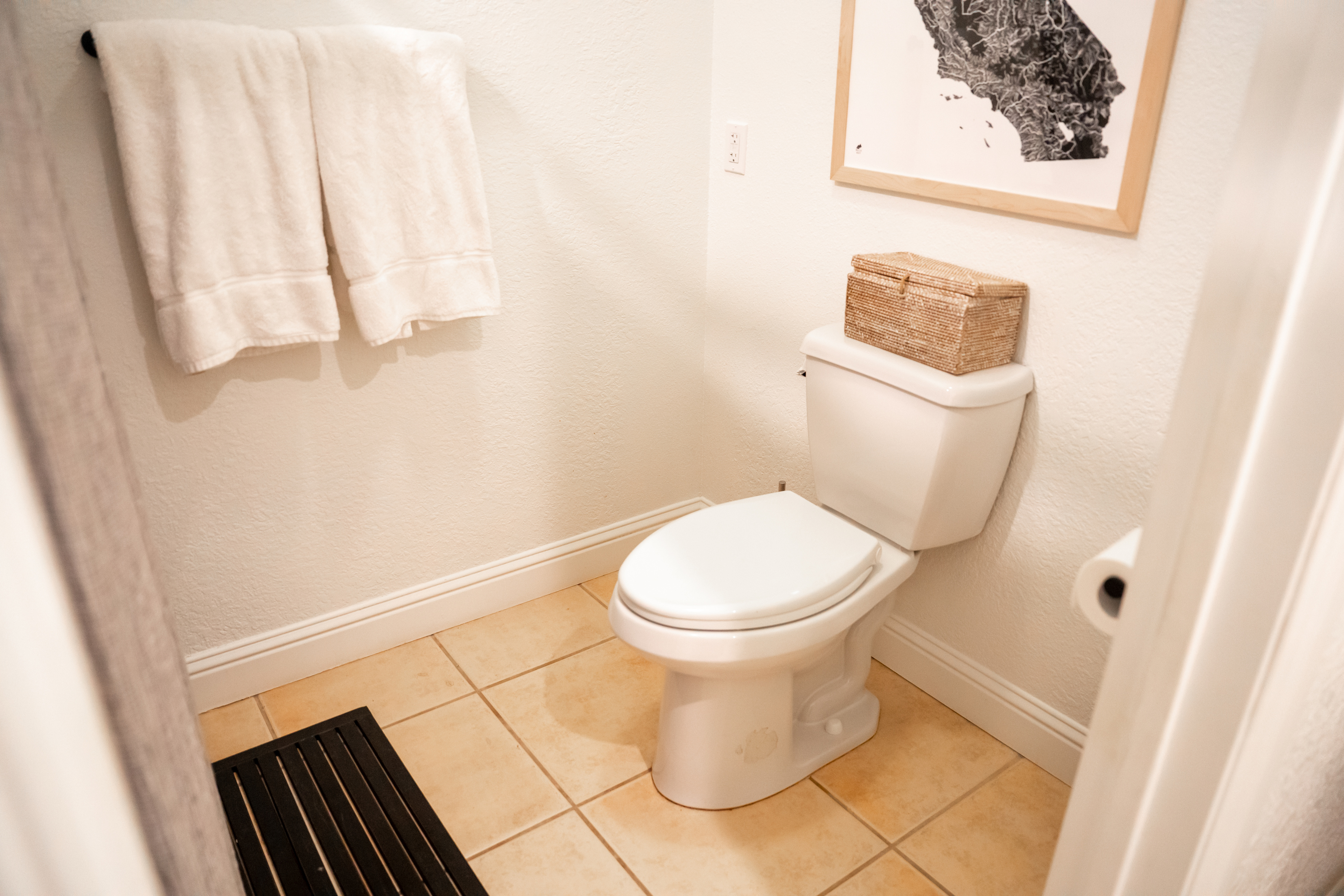 The bathroom in the main house was super clean and equipped with a shower. Towels were provided as well.