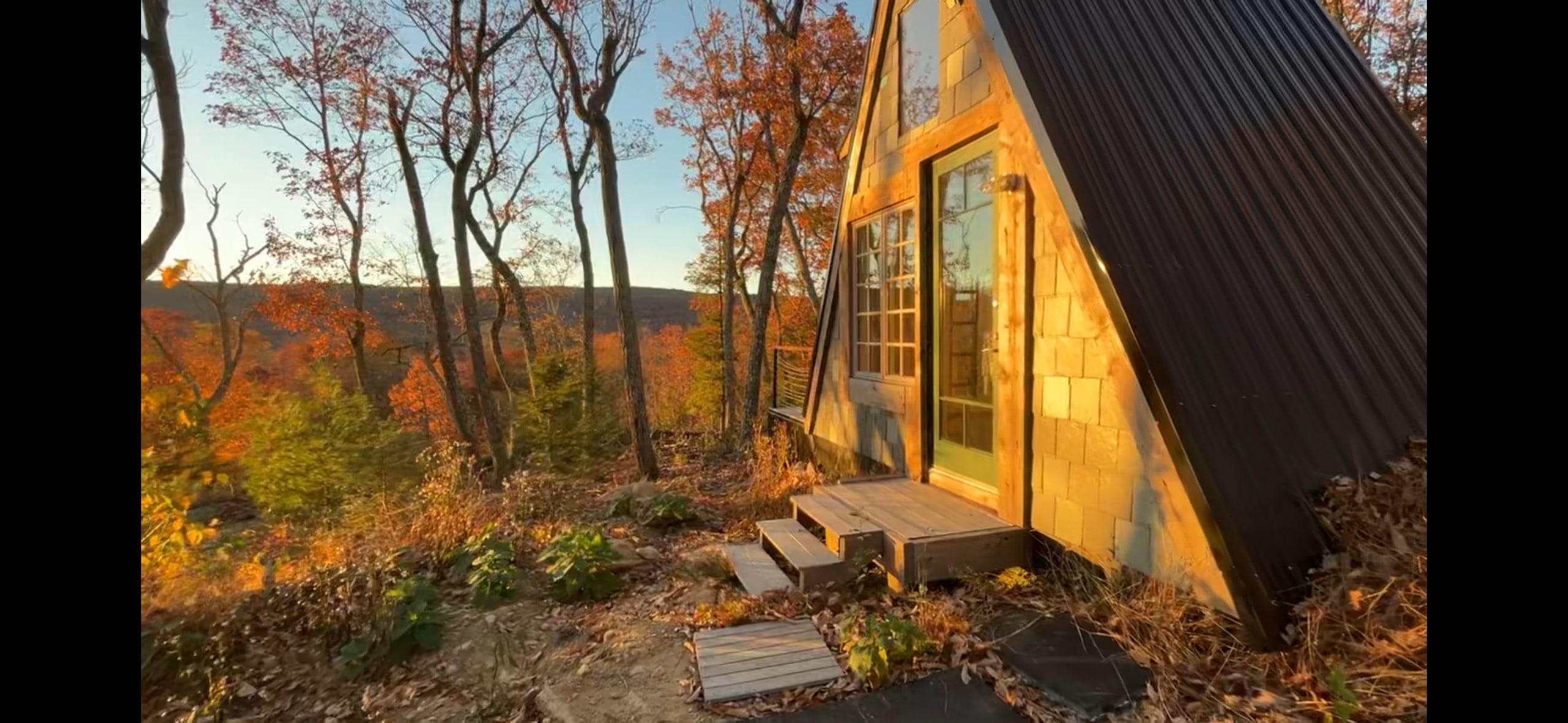 The entrance to the A-frame at sunset. Located on the second highest elevation on the property and about 600 feet above Greenwood Lake. 