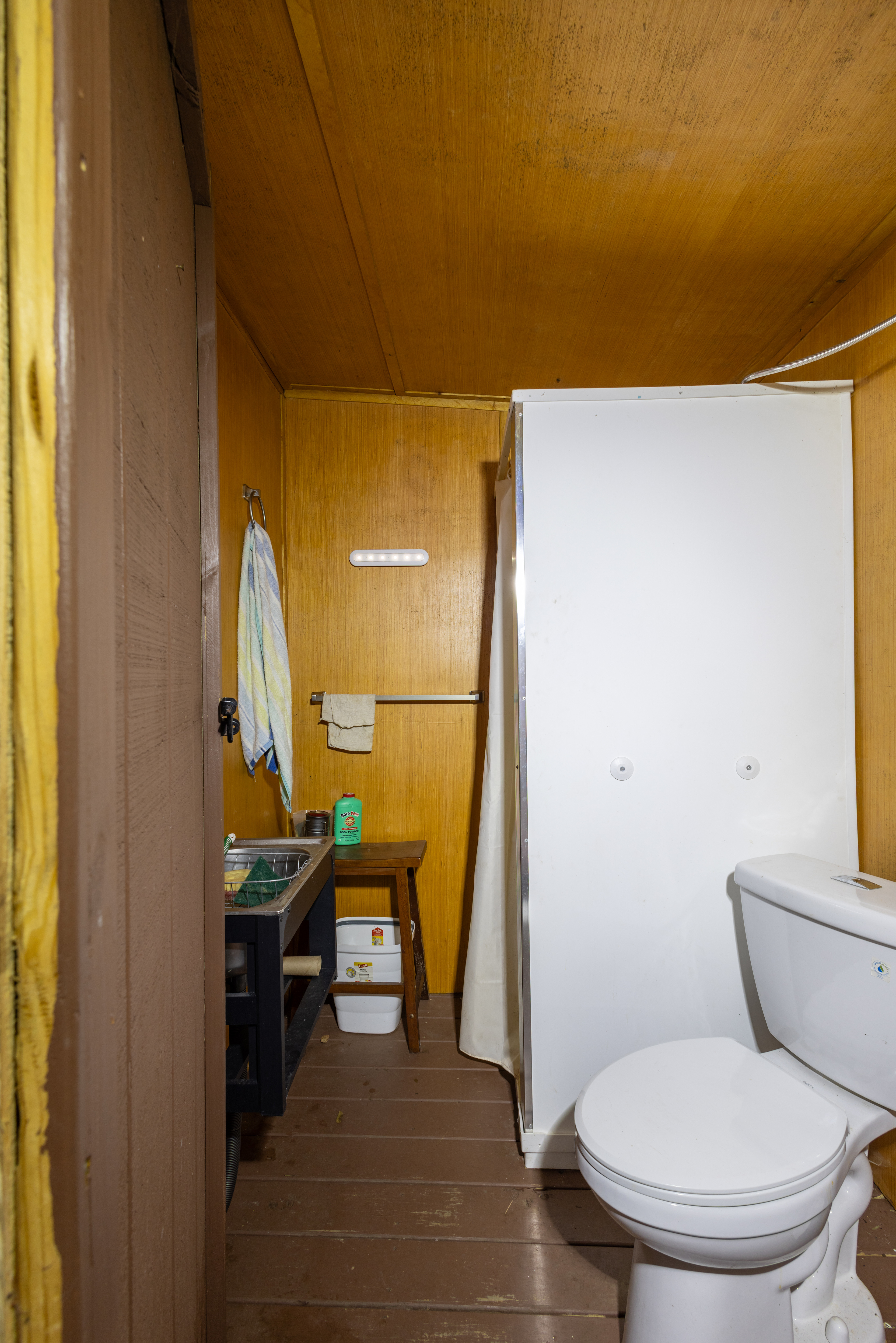 Bathroom with hot water heater.