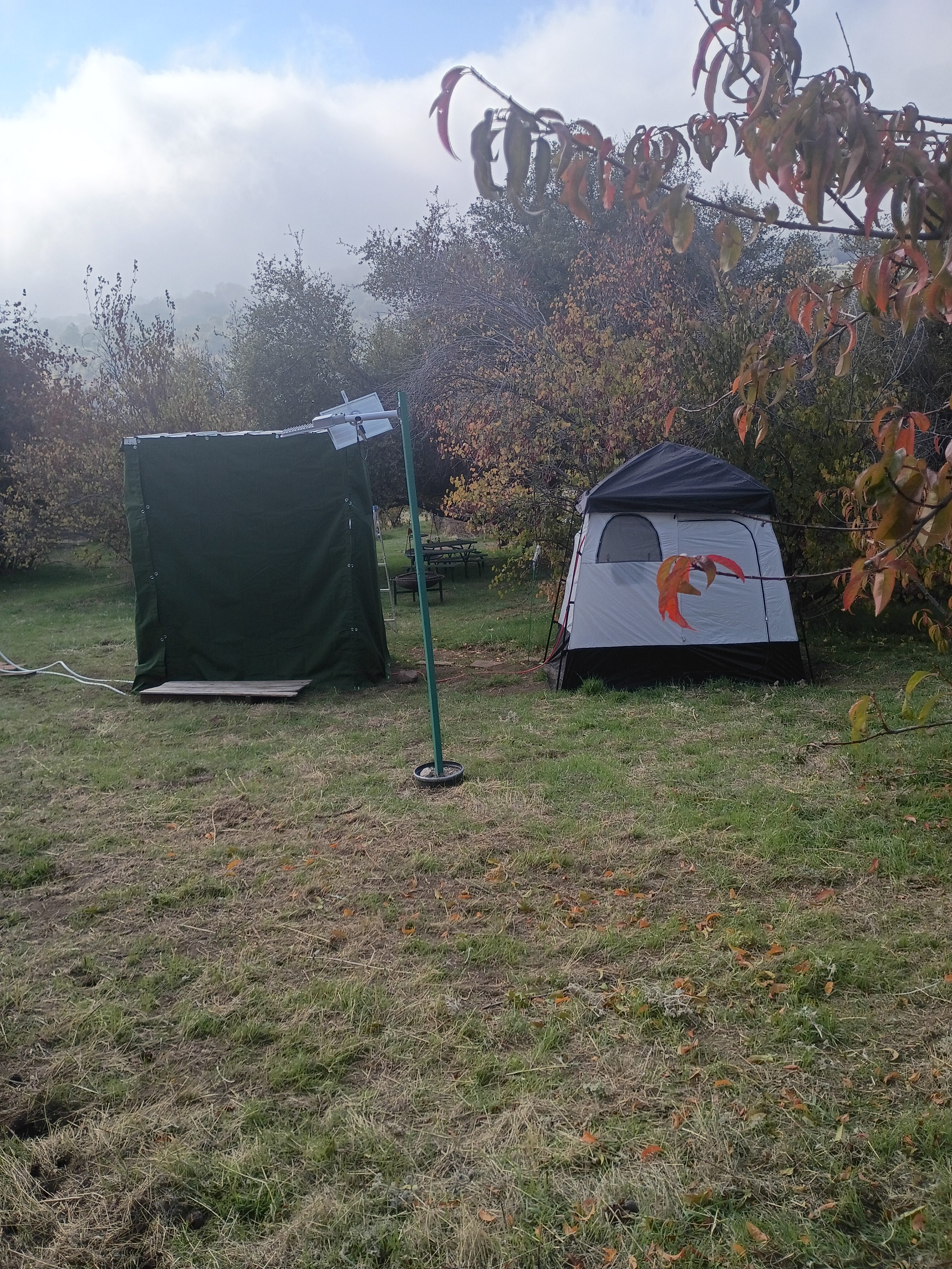 The shower and sink tents. There is a hot water hose that can be used for both. 