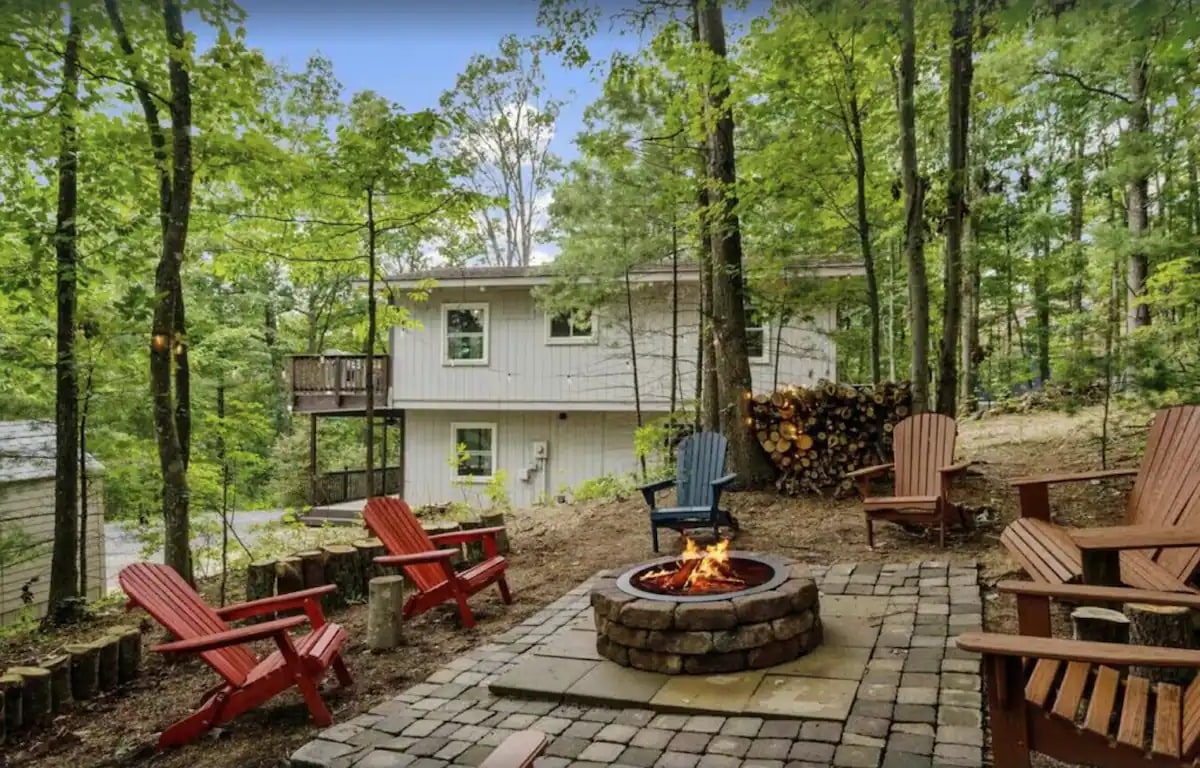 Cozy up by the fire pit in the woods