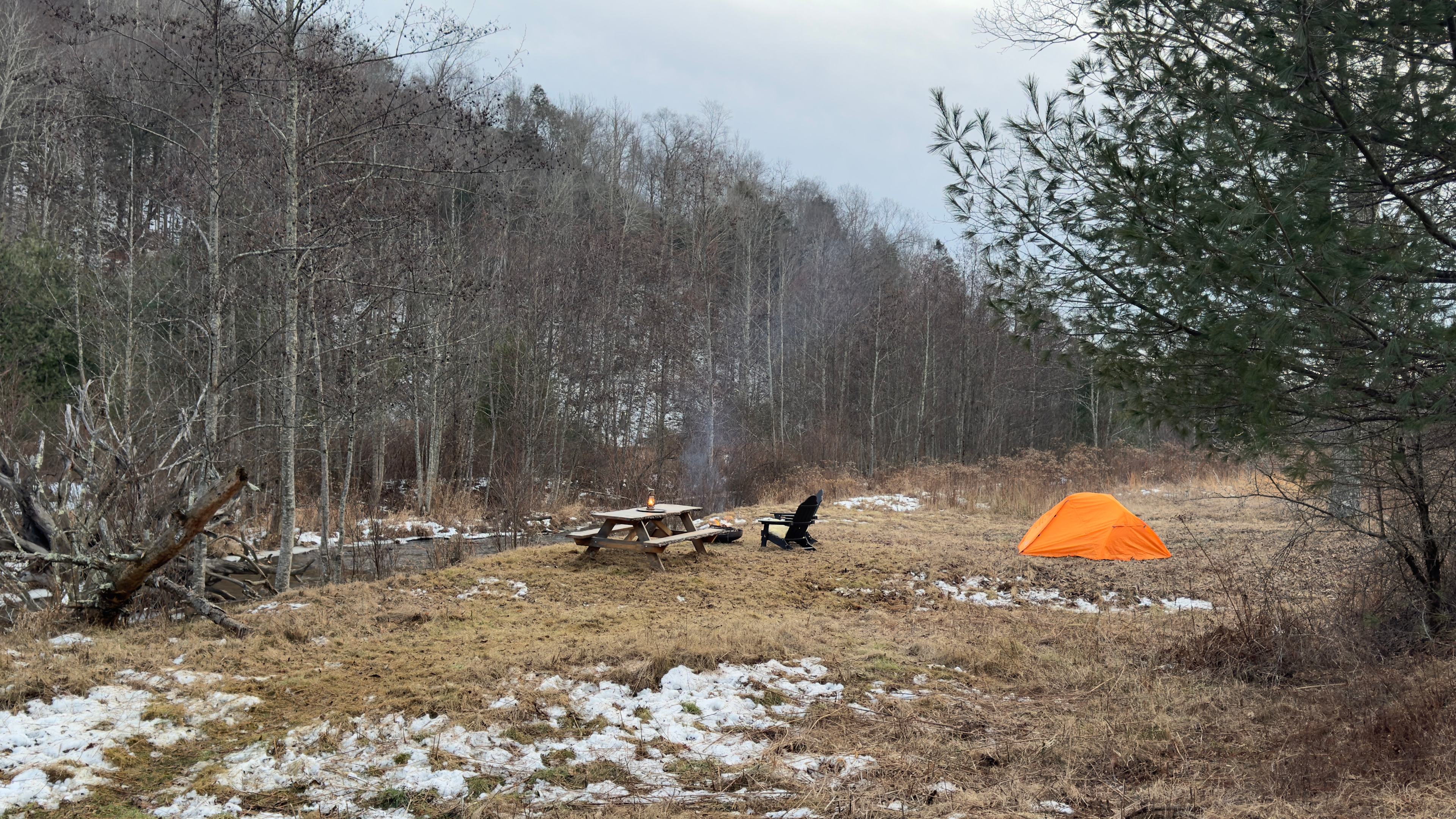 Here we have set the tent up underneath the Hickory tree, but there is another site closer to the creek and the fire pit that is flat as well and is perfect for a second tent.