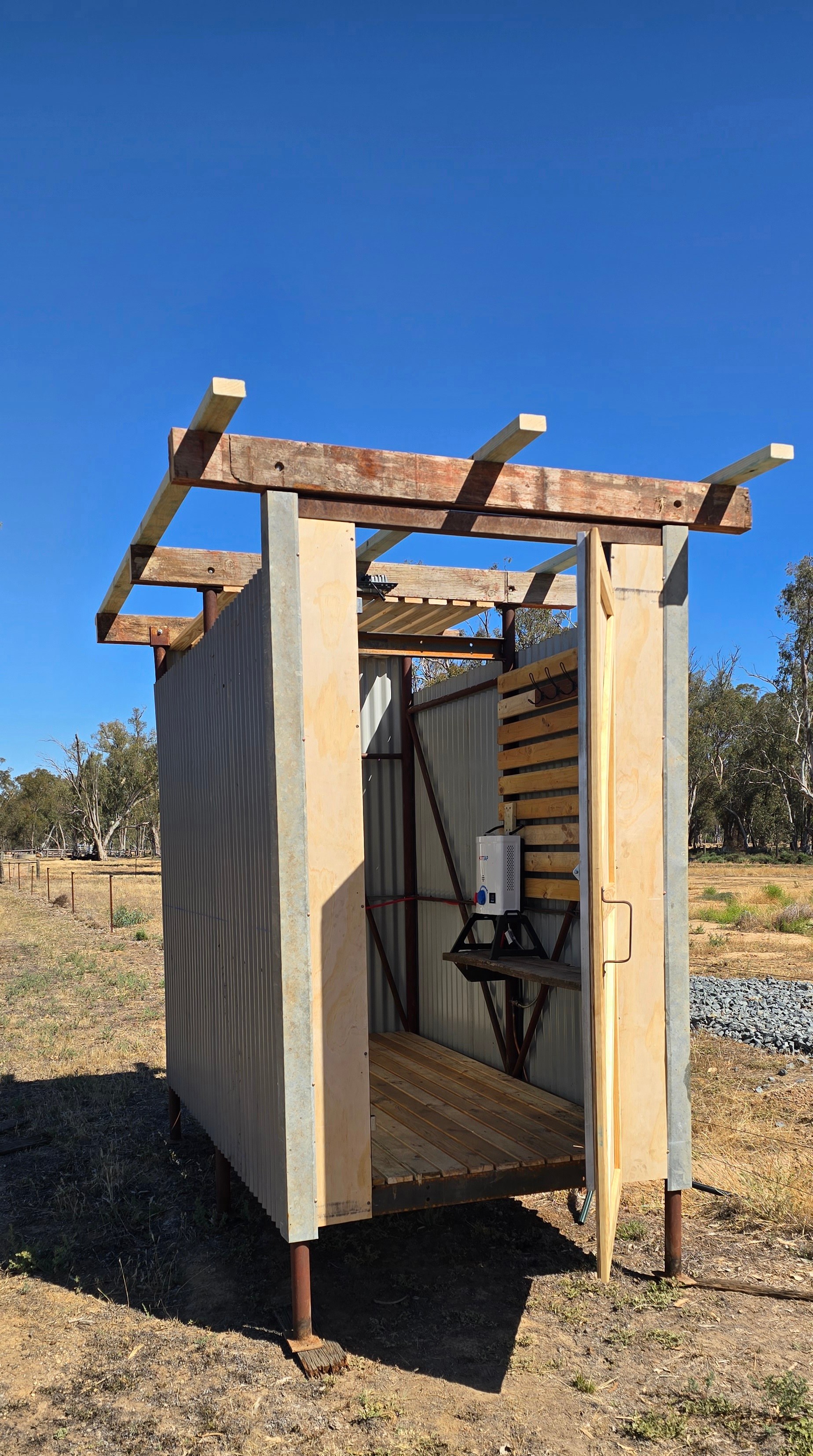 Its origins were a tank stand, now converted to a luxurious hot water shower! It is simply divine, shower under the stars - or to cool off after a hot day camping. 