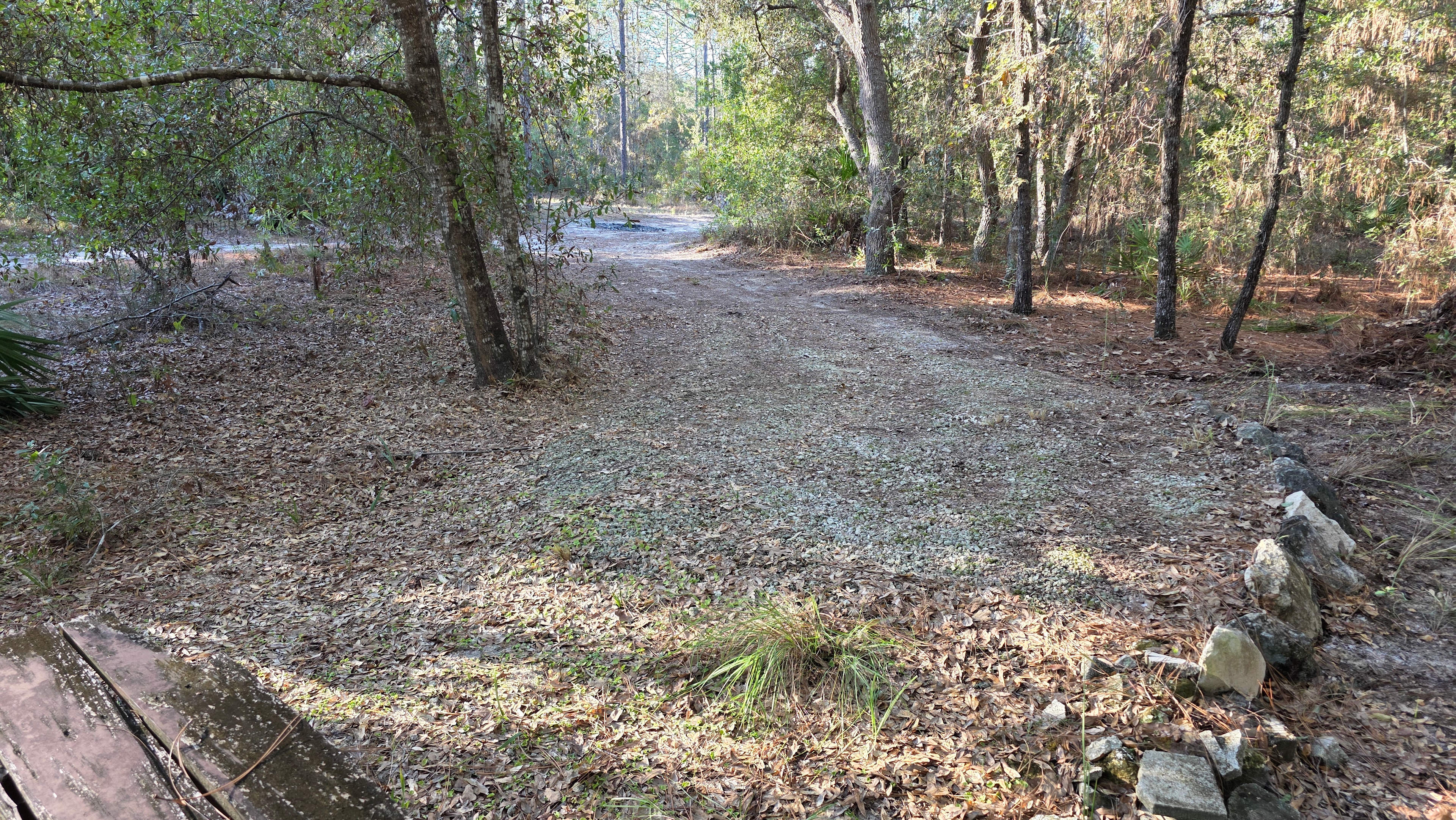 1 of 2 RV pads. Will accommodate up to a 25ft bumper pull RV. Has 50amp electrical service and water.