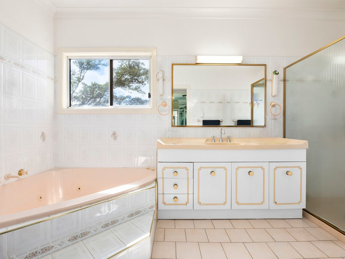 Upstairs bathroom complete with spa for your relaxation after a big day.