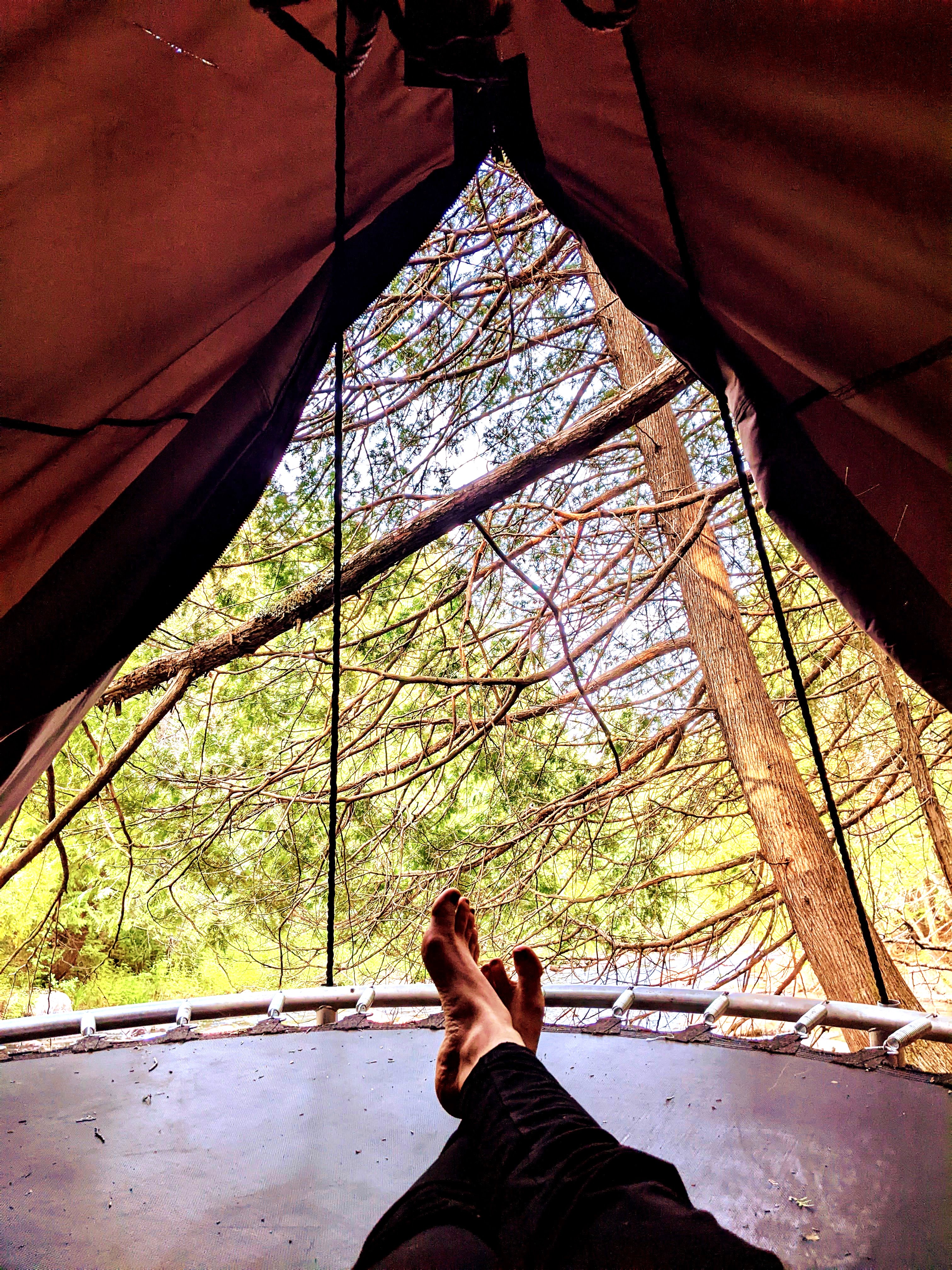 A teepee sheltered from mosquitoes, perfect for a nap or reading.