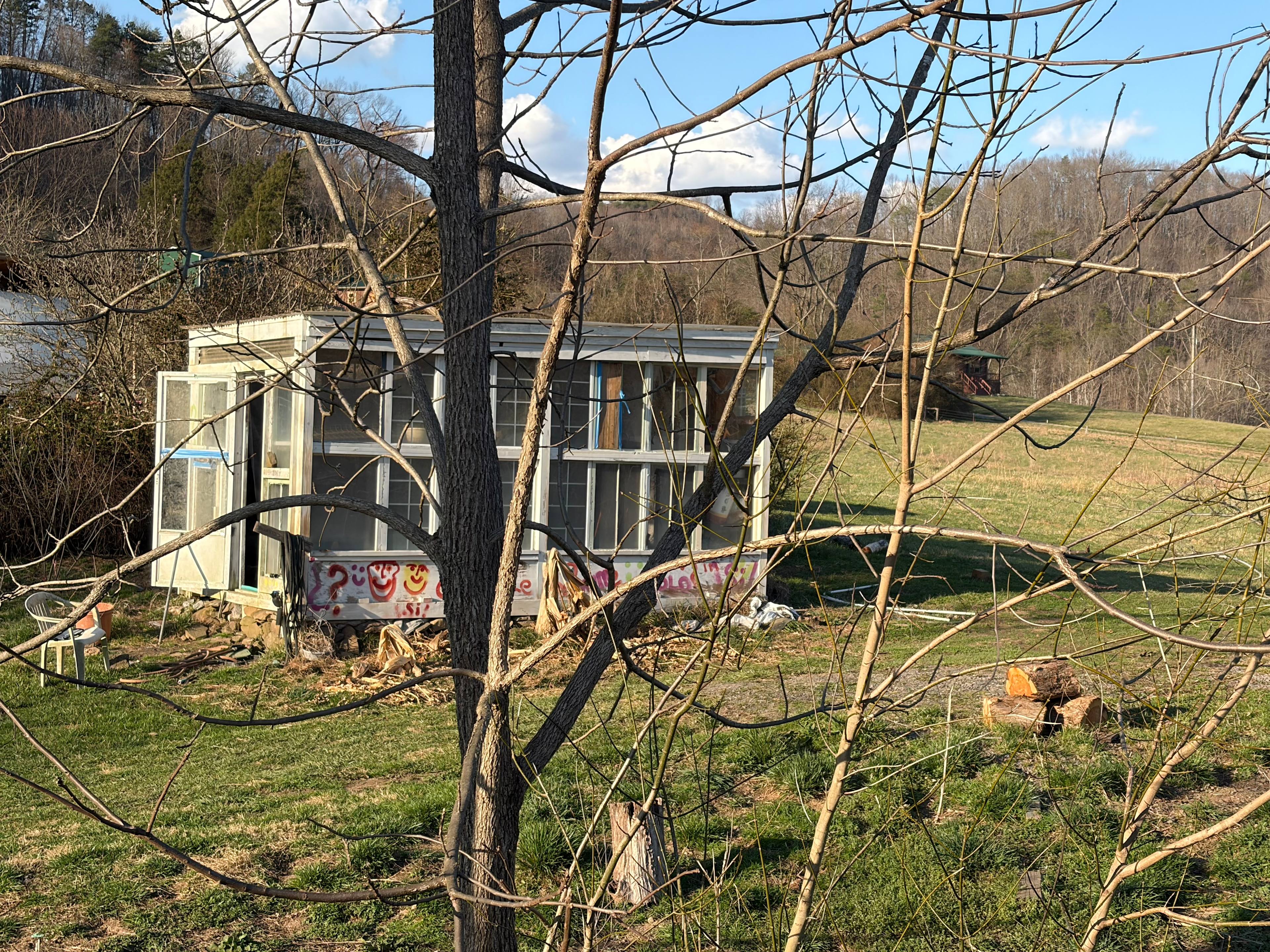 RV hook up site next to Greenhouse 