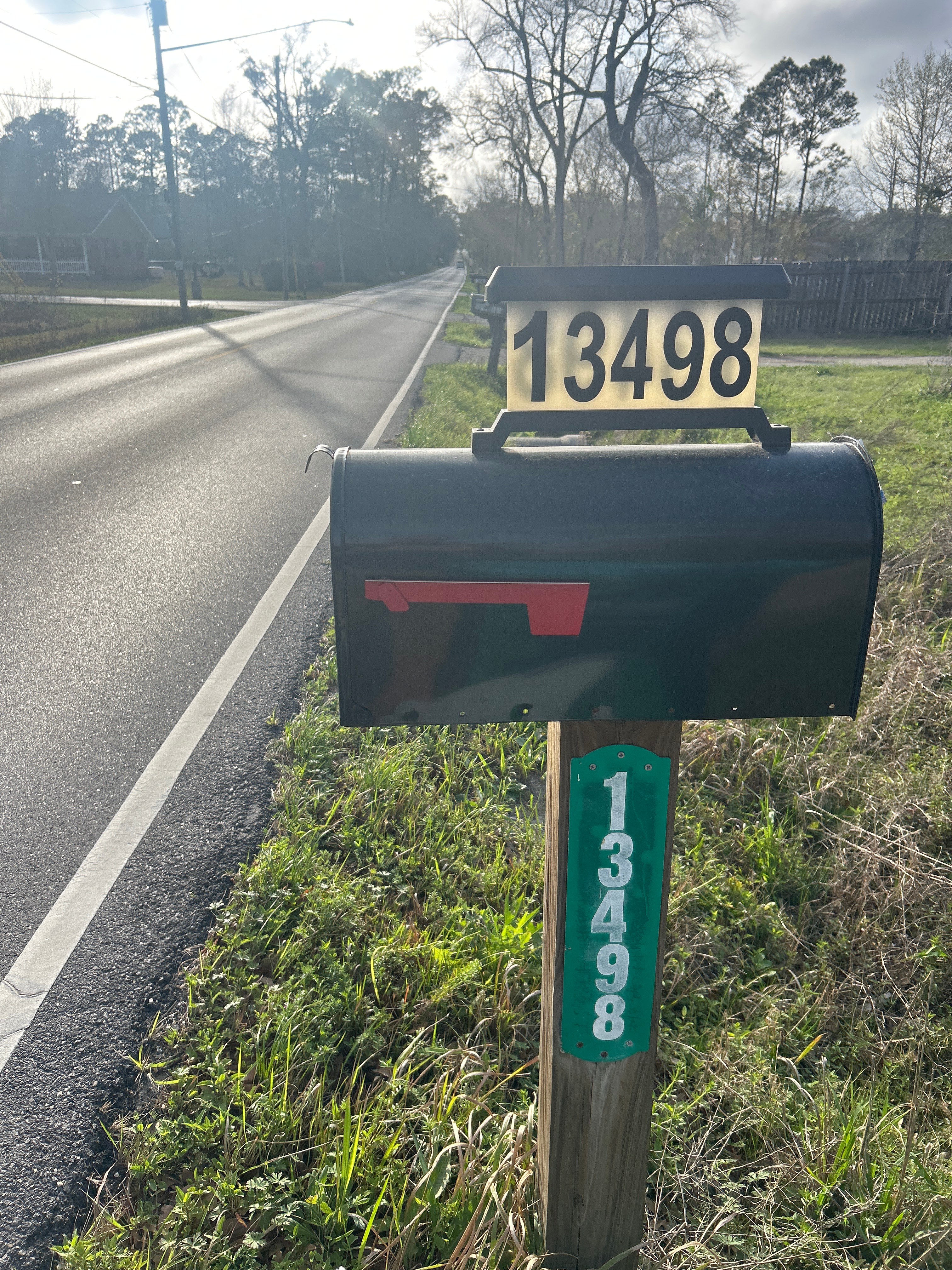 Driveway is on North side of John Clark Rd. Look for Multicolored LED light on top of mailbox. Follow gravel driveway to one-way loop