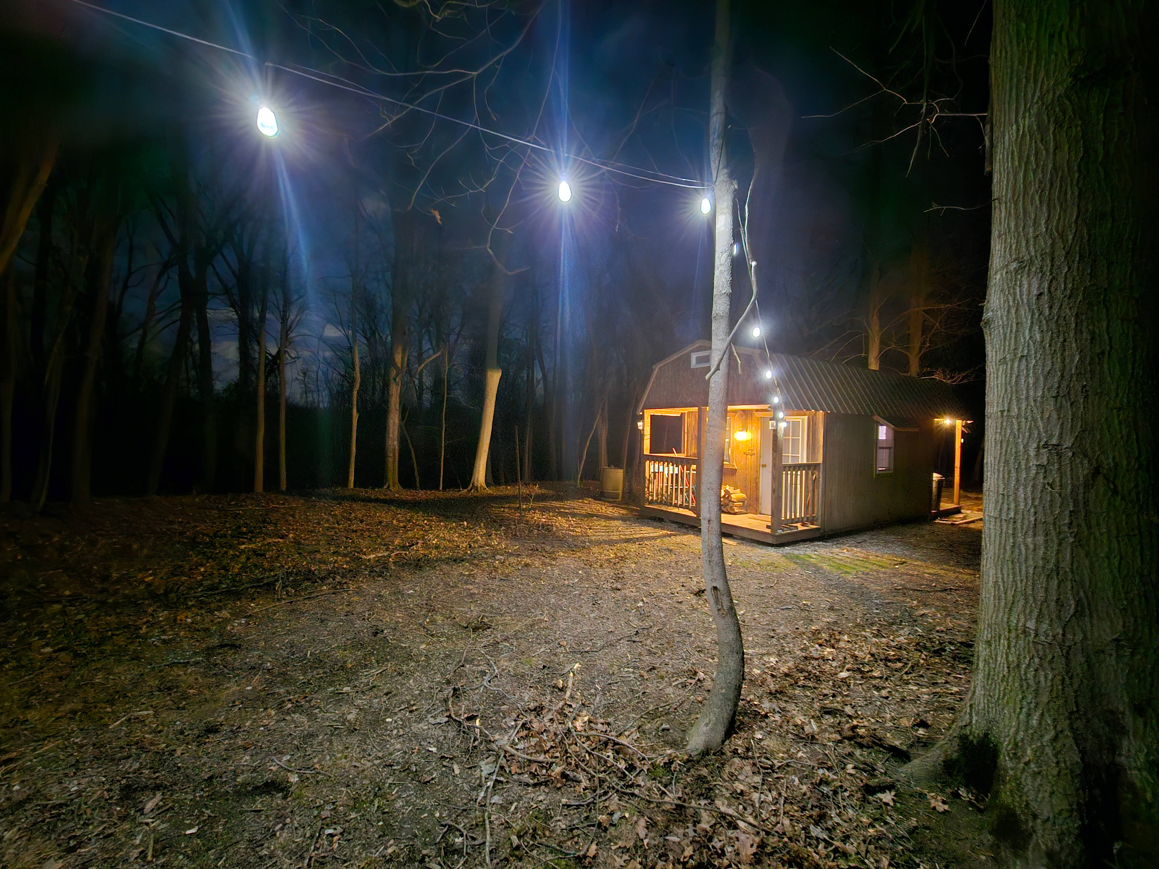 Pic of cabin from the drive. Love the lights!