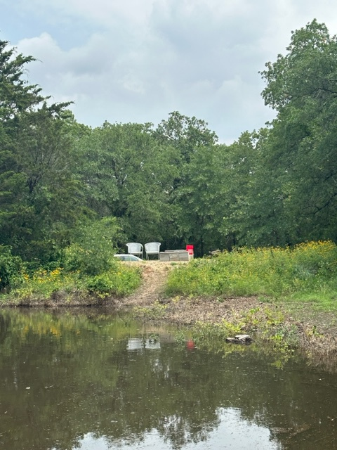 Seasonal pond "ebbs and flows" with water. We allow to sift through and fill back up in order to keep the ecosystem free from harmful diseases. 