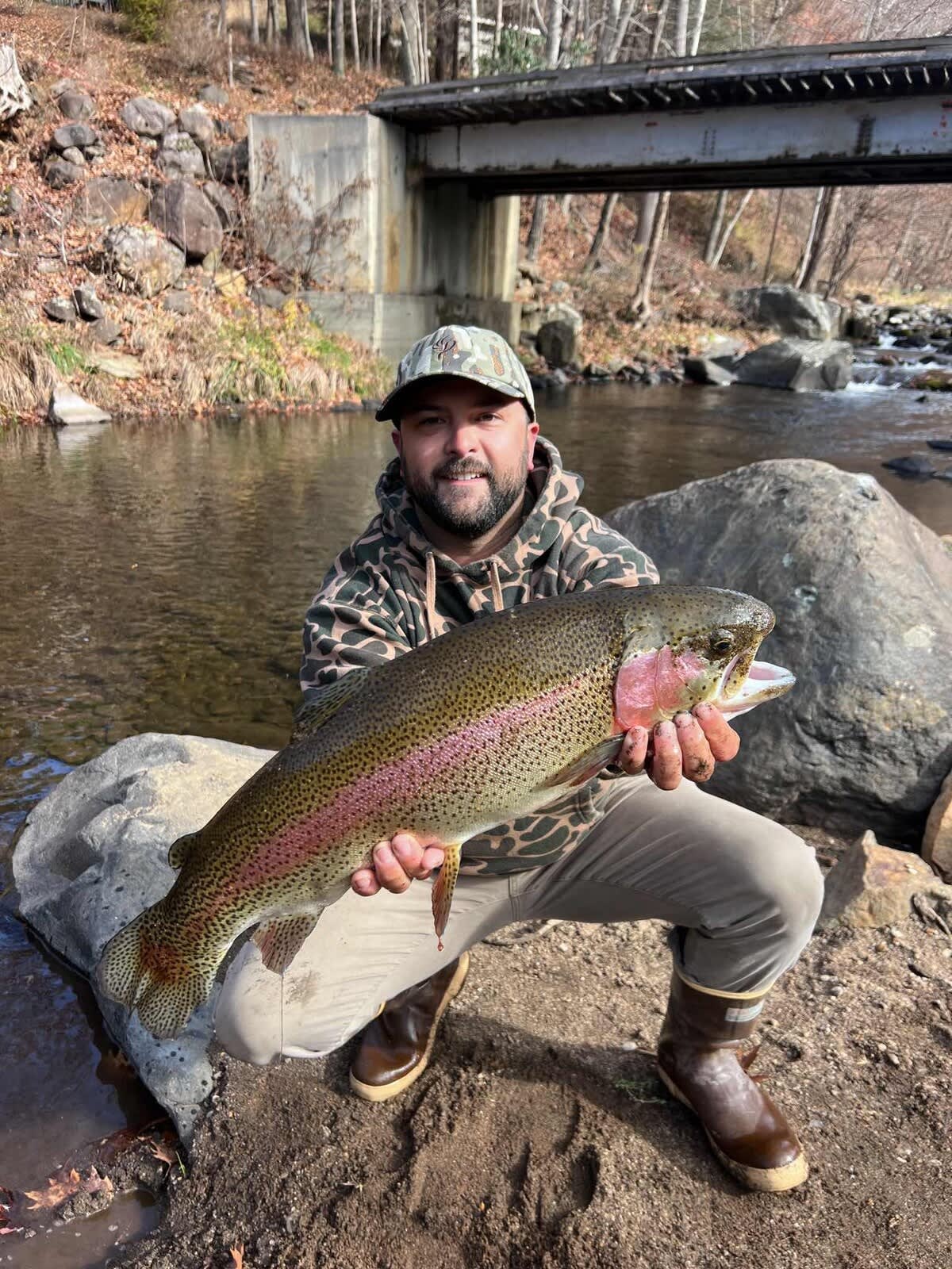 Happy guest with his picture of his fish.