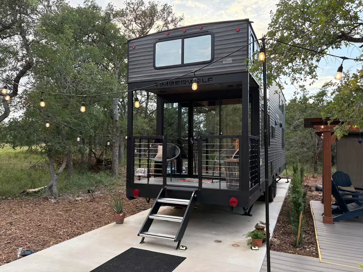 Your front door and porch - relax with your morning coffee, listening to nature or your choice of music on the surround sound Bluetooth.  Custom lighting exterior lighting for quiet evenings, enjoying nature.