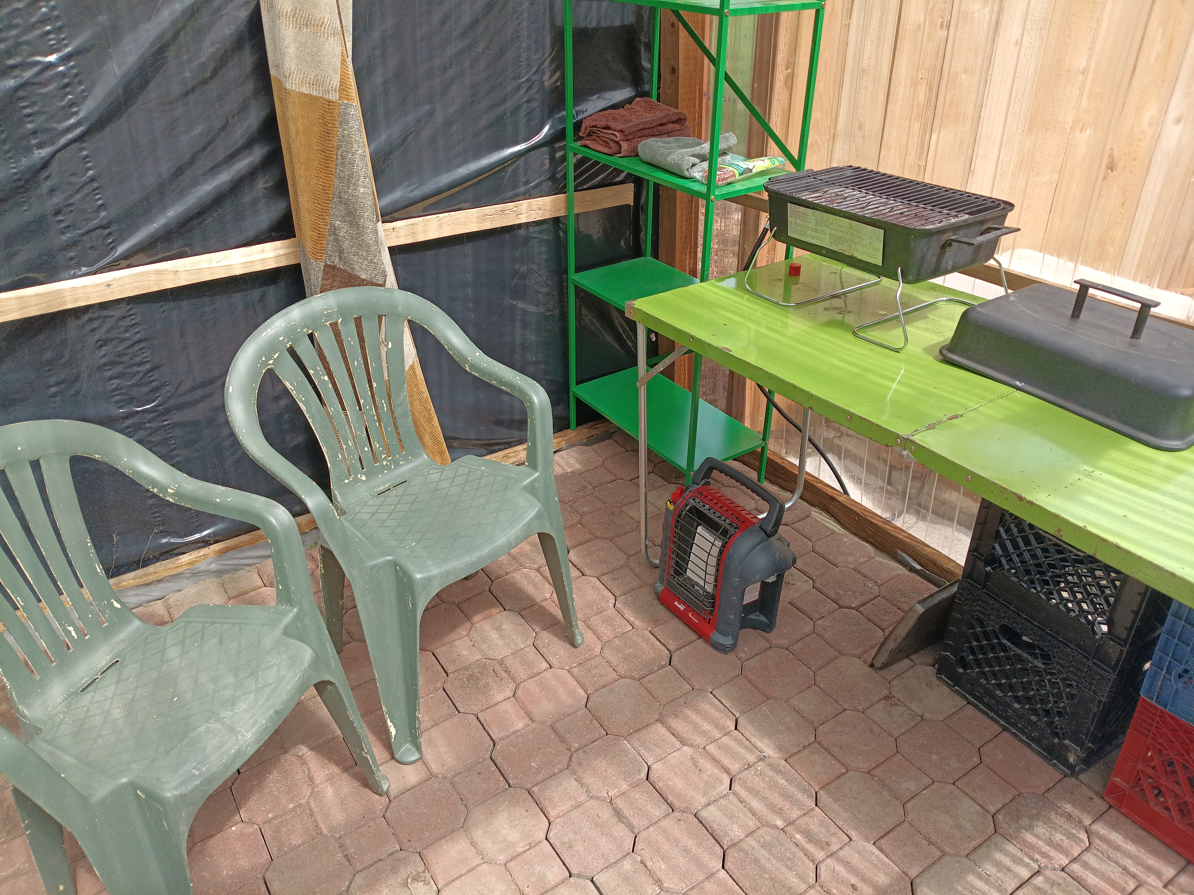 The propane stove and propane heater are connected to a refillable 20 lb propane tank.