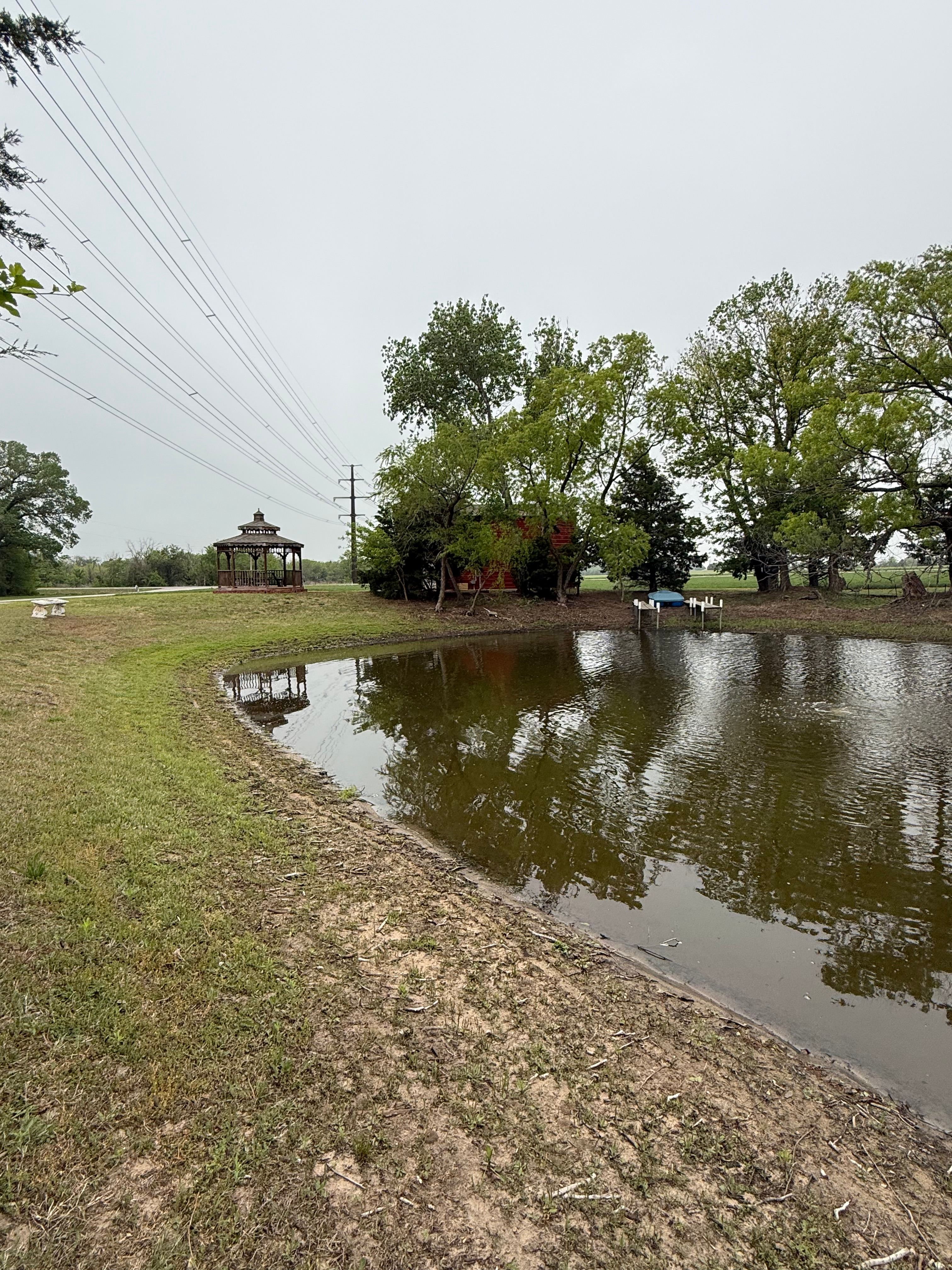 RV Camping Next To Pond & Gazebo