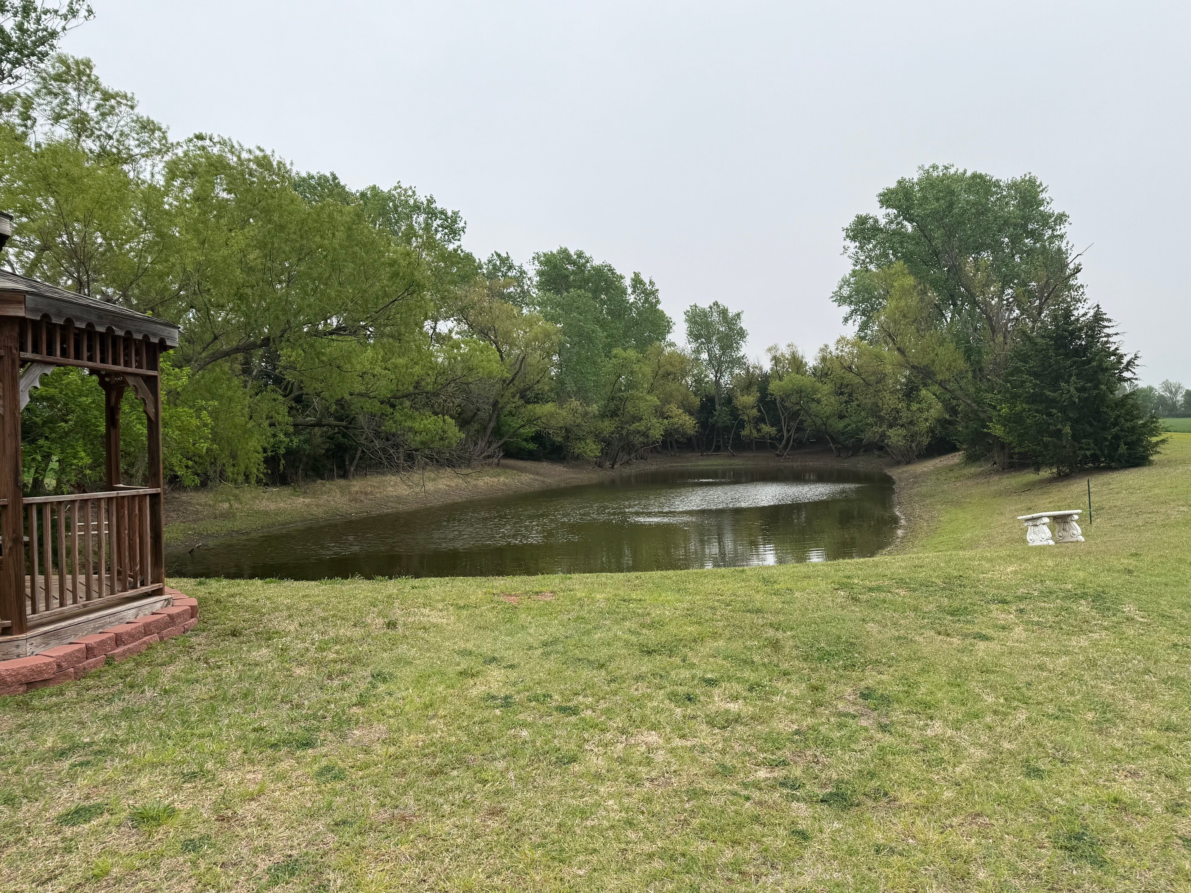 RV Camping Next To Pond & Gazebo