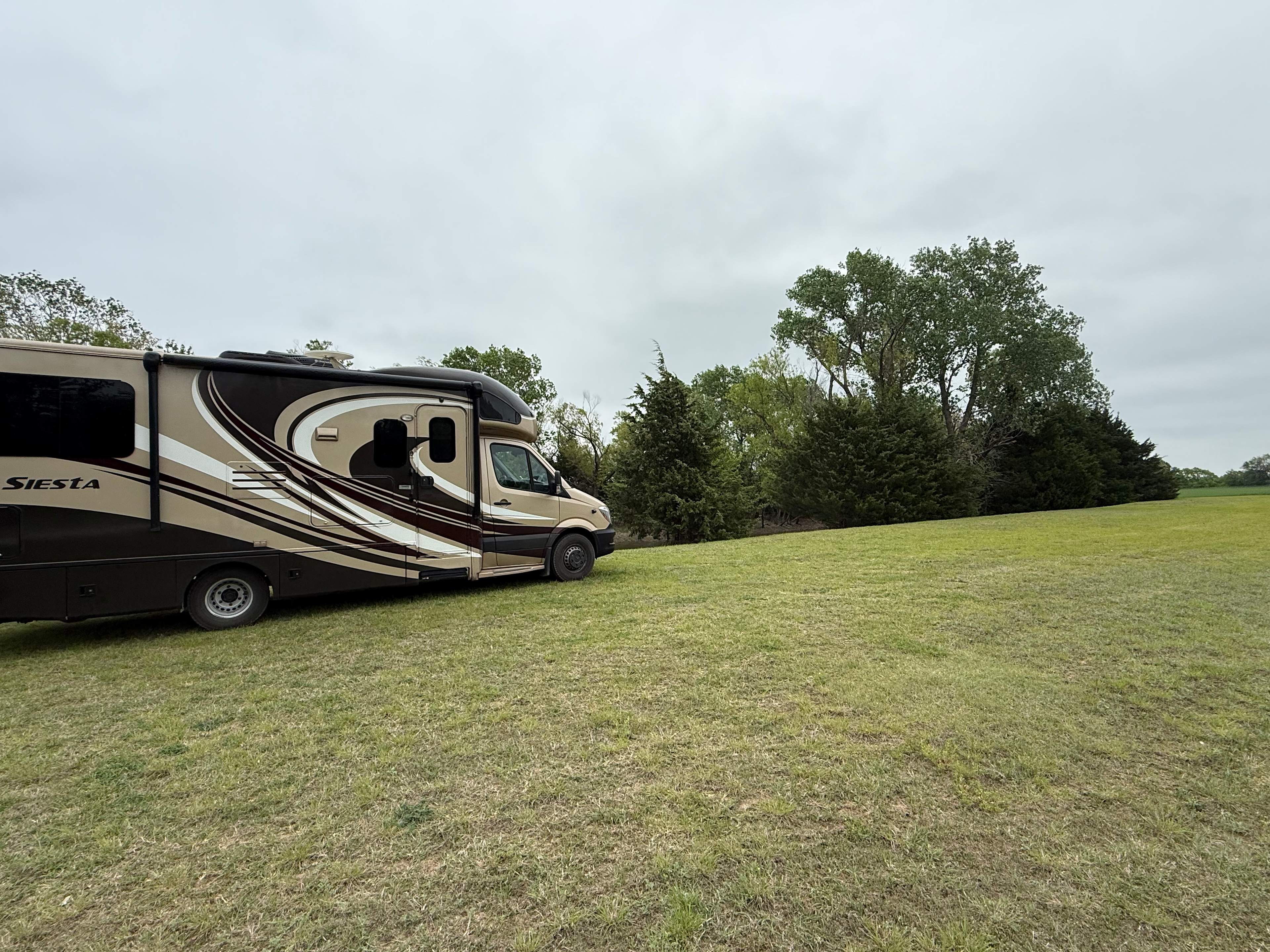 RV Camping Next To Pond & Gazebo