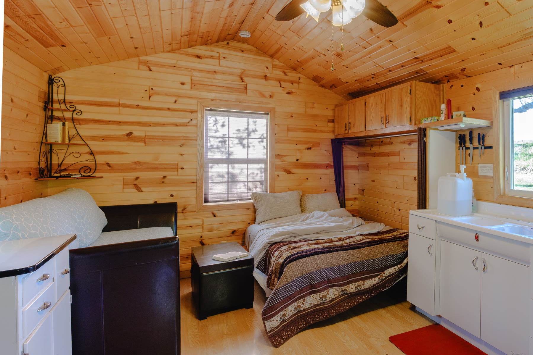The murphy bed disappears into the wall when you need more space. 