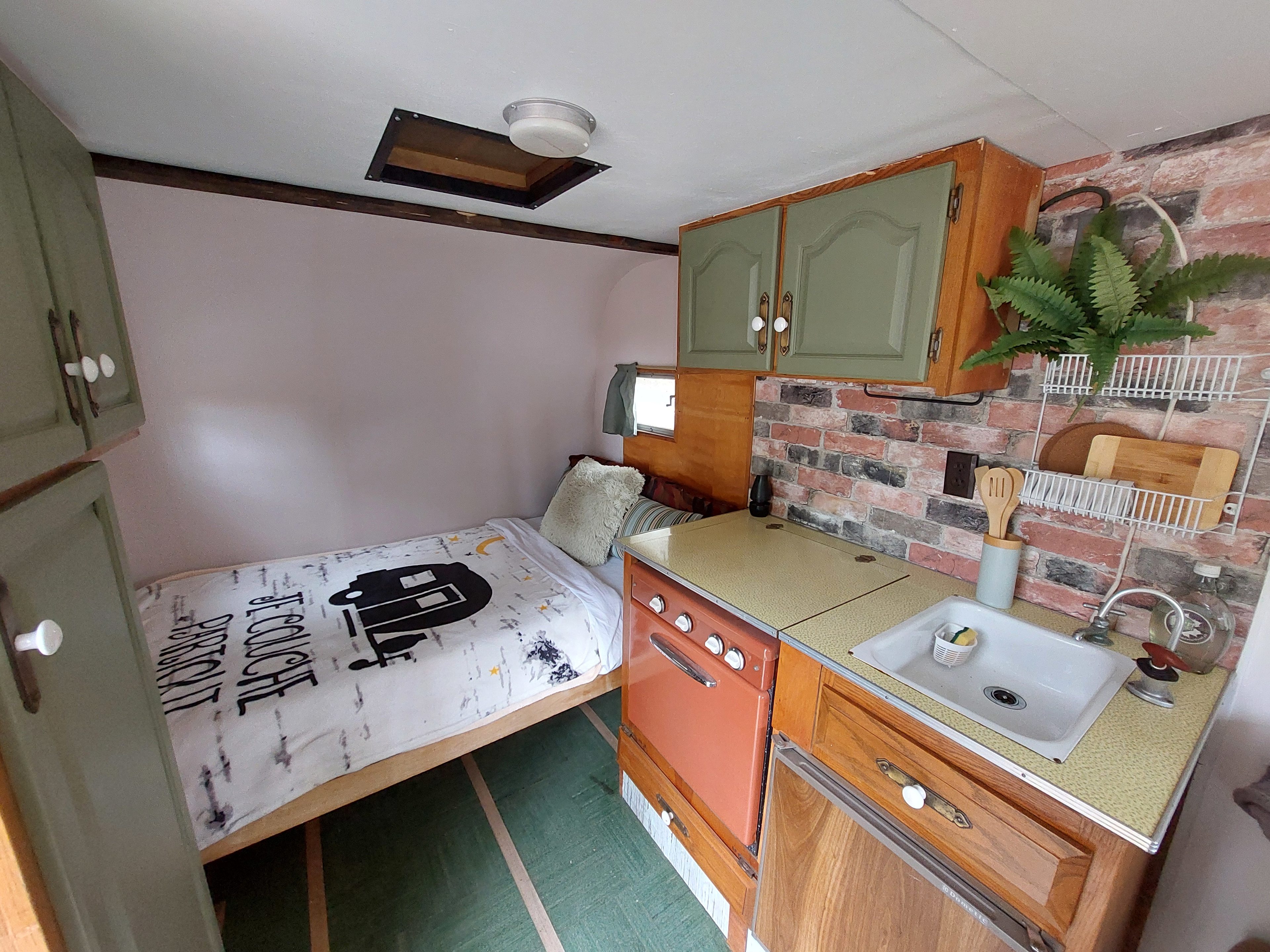 Kitchenette and bed