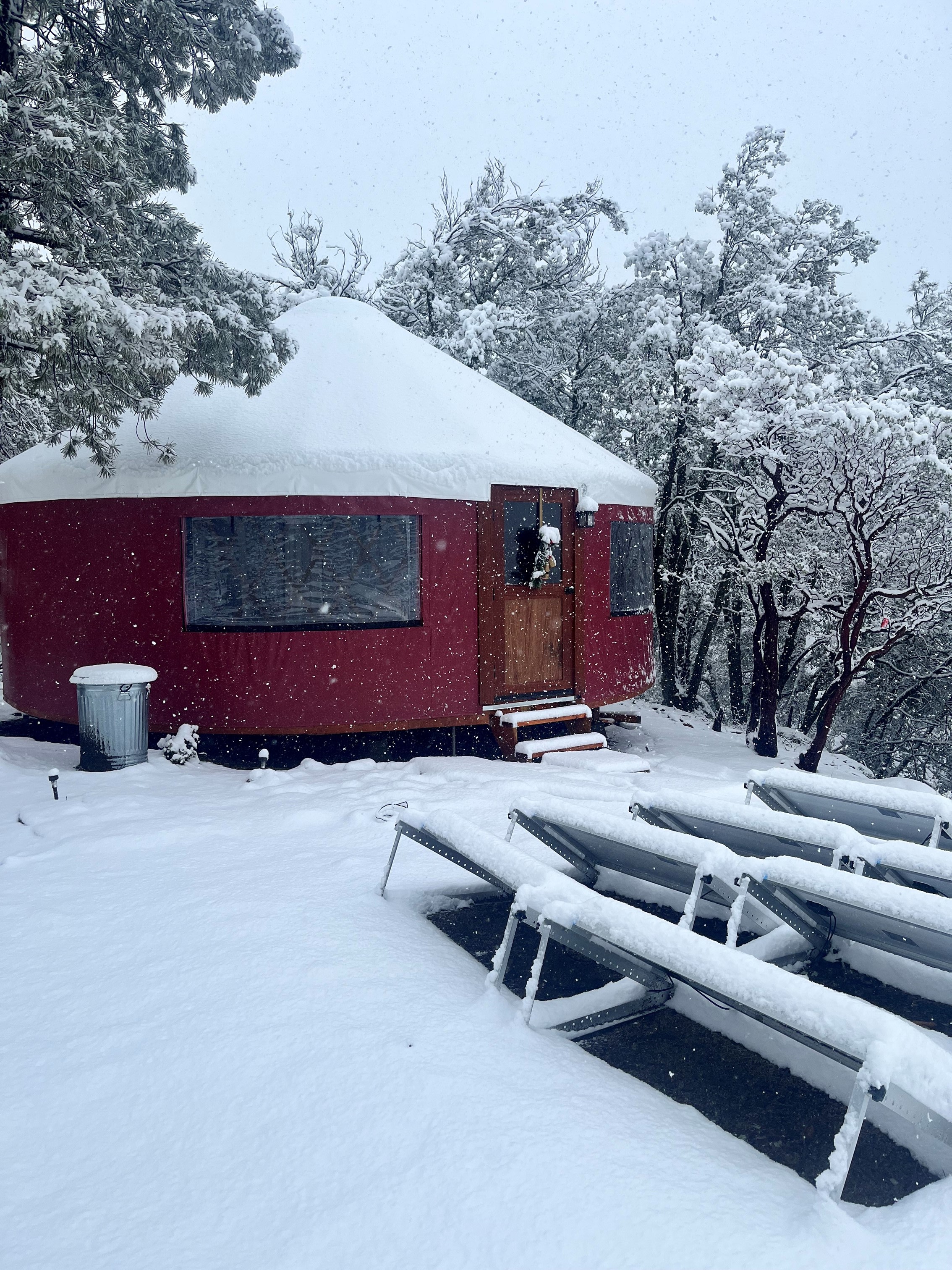 Warm and cozy inside with a wood burning stove, makes even a snowy day is magical. 