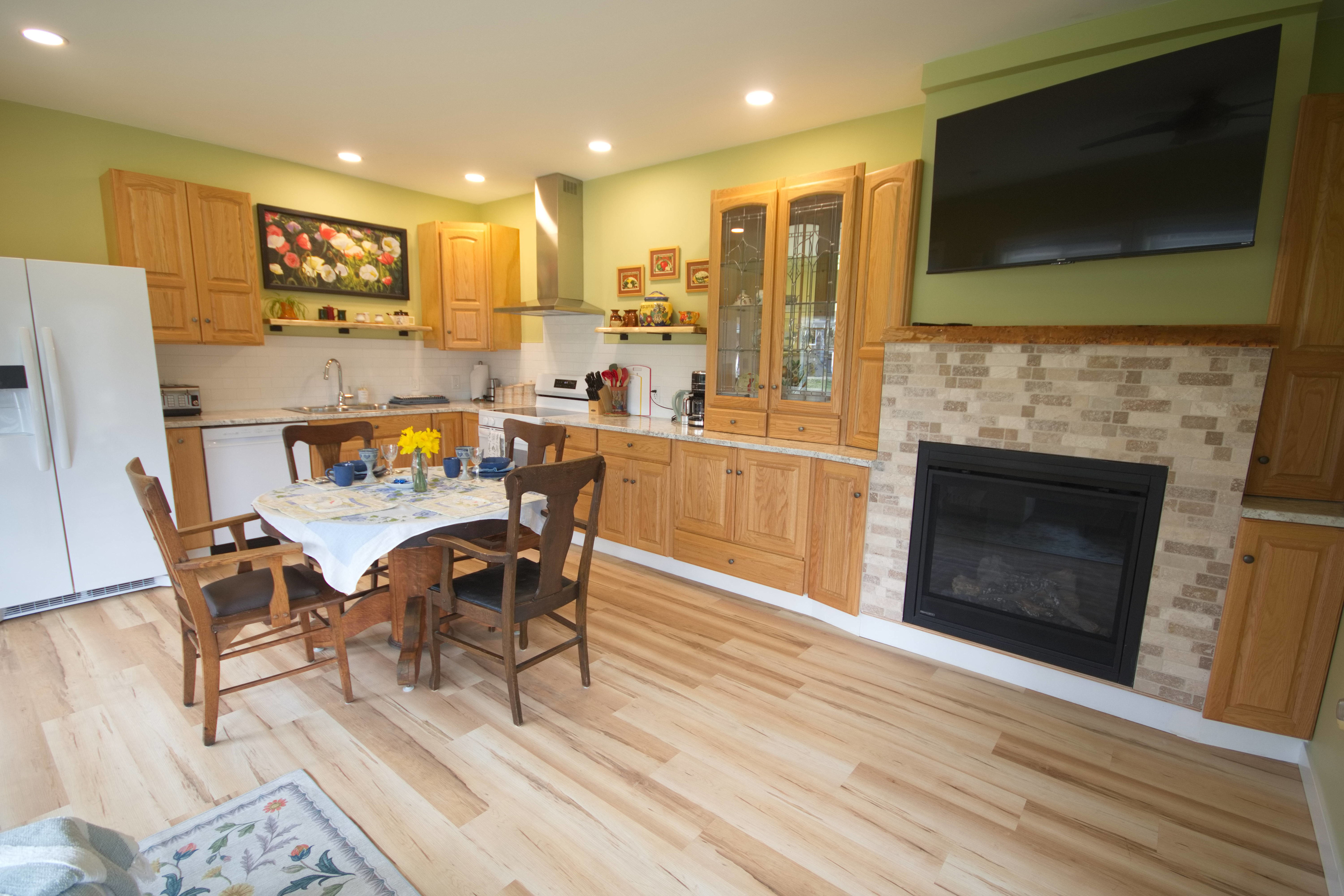 Natural Gas Fireplace in living area with a 50" Roku TV.  