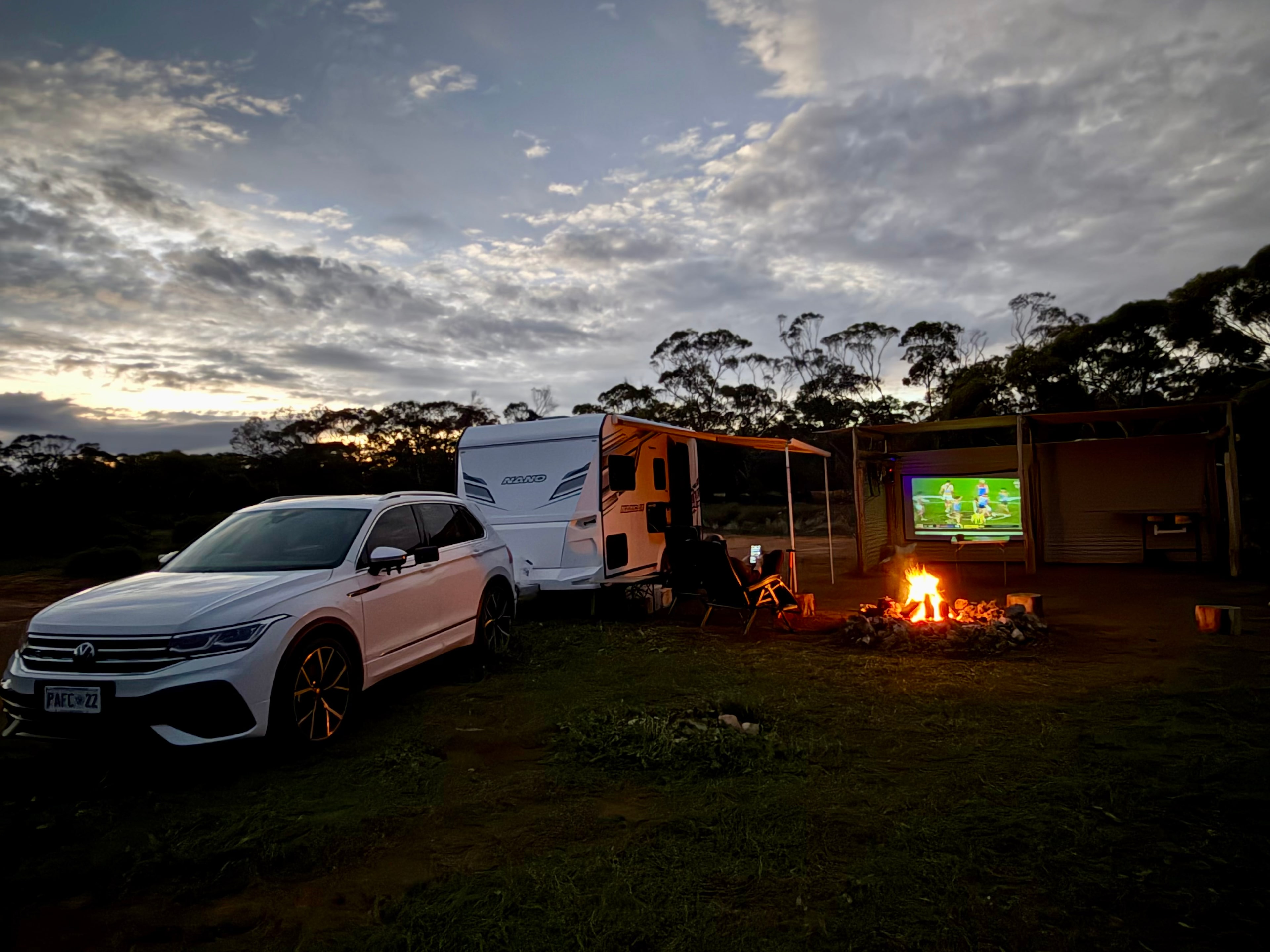 We used the shelter to hang our screen for the projector so we could watch footy by the campfire. 