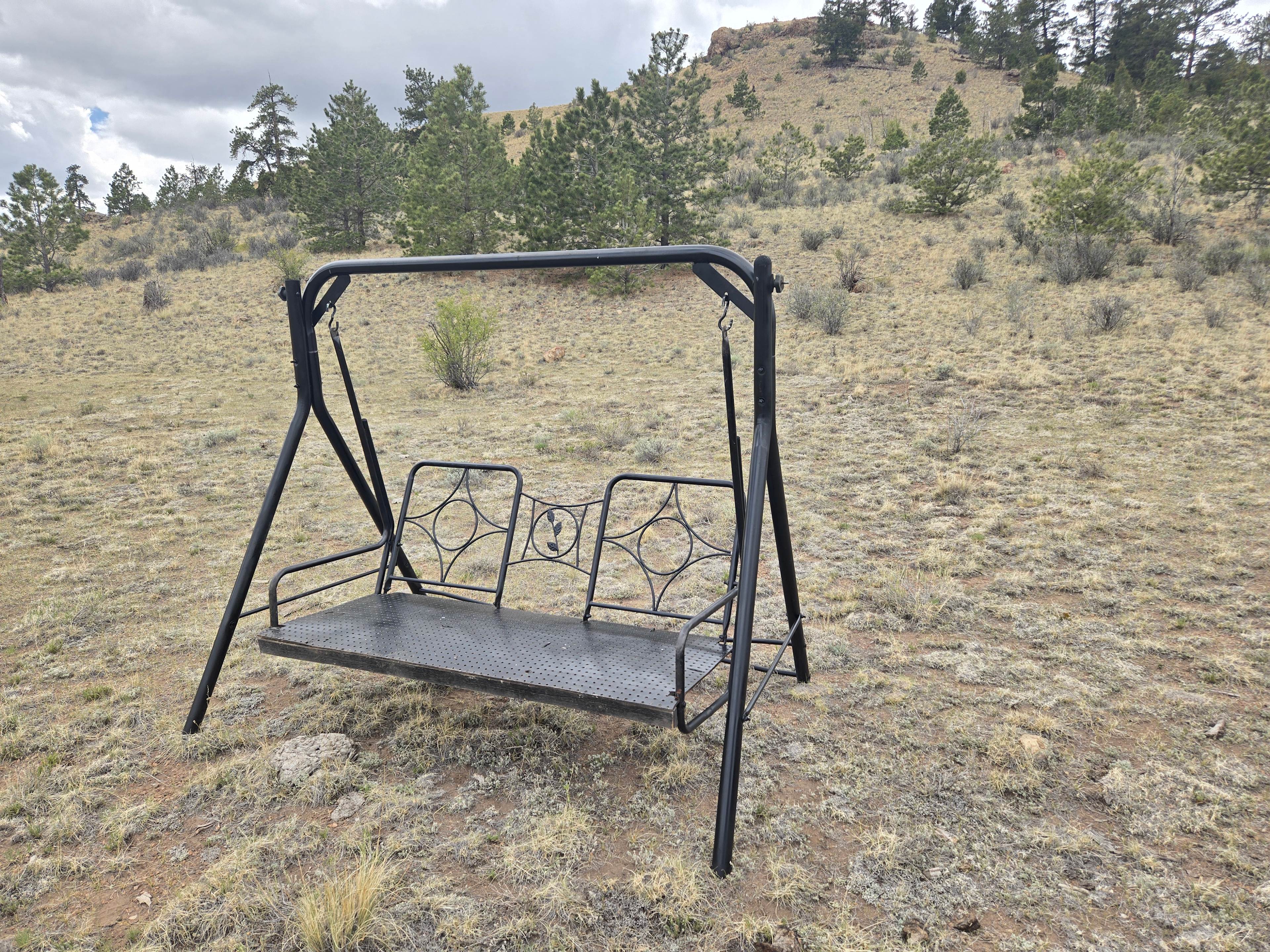 This porch swing is by the shed and can be used by guests. It is not padded. Please be respectful and put it back as it was found.