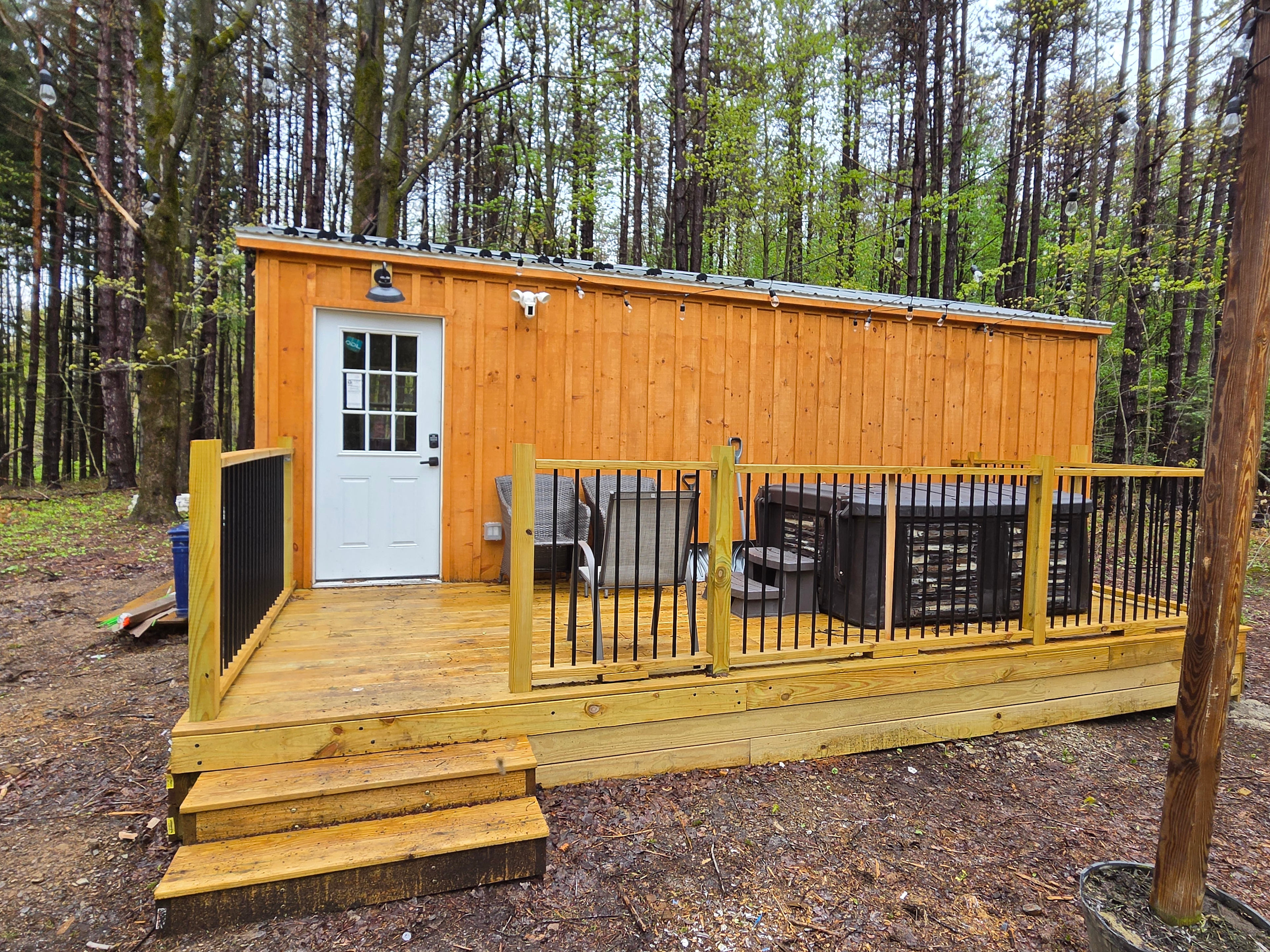 Fully insulated 12x26 cabin with hot tub. We have heat & AC. Perfect place to enjoy the outdoors and get away from it all. 