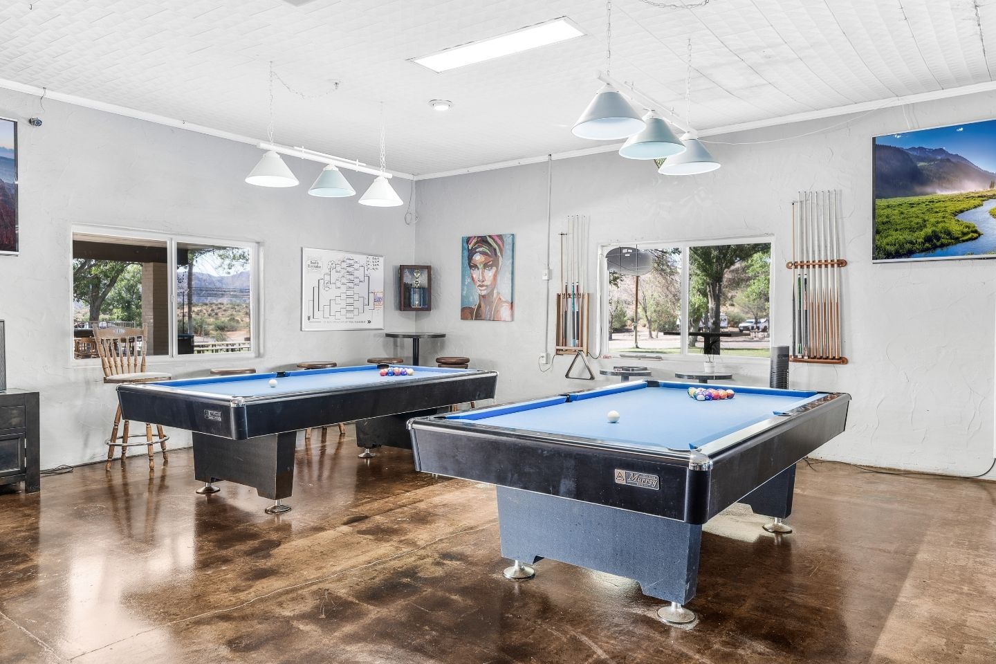 Relax and unwind in our recreation hall featuring pool tables, games, and space to gather after a day of hiking and exploring the desert.