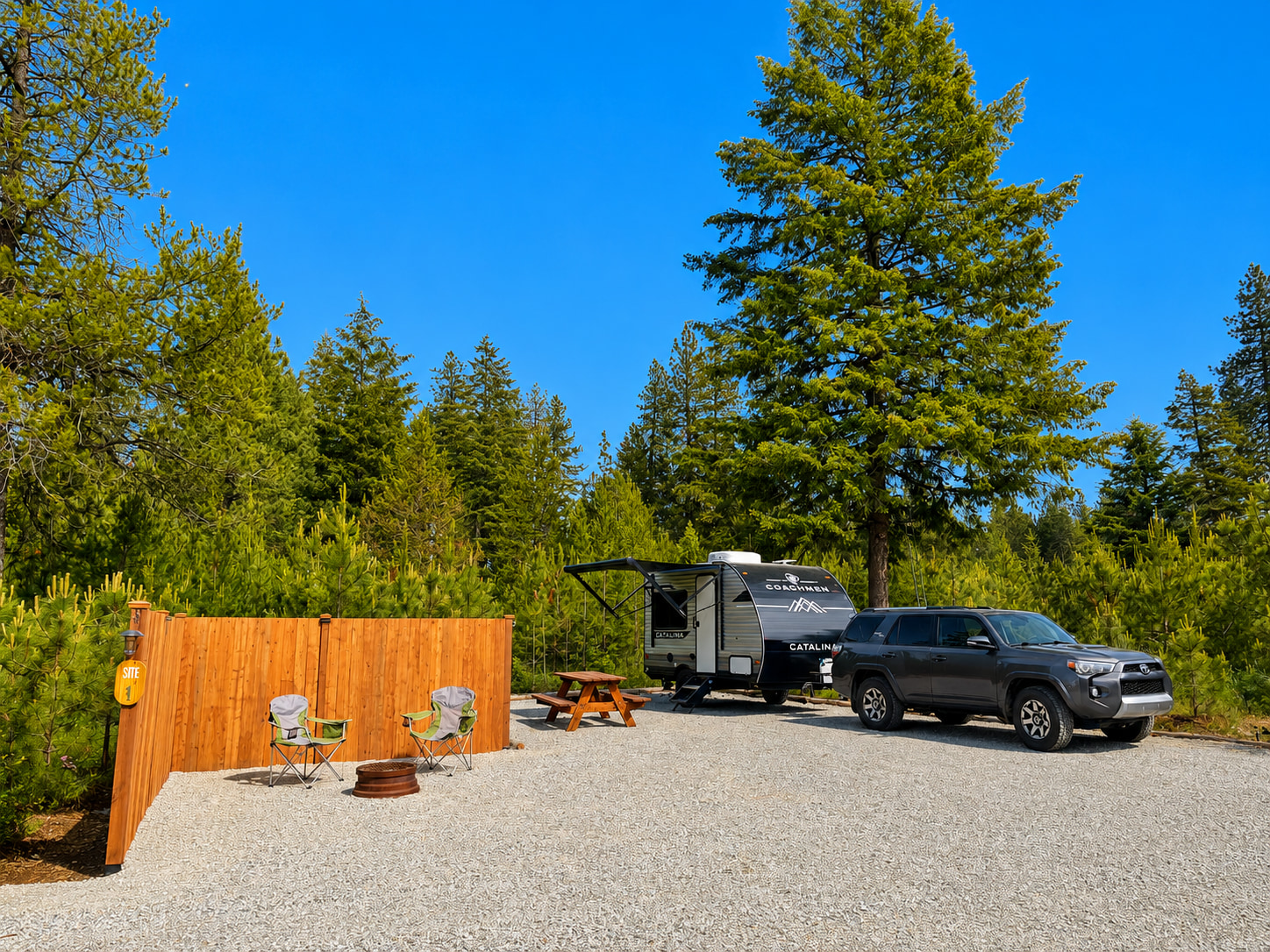 Site 1 entrance from camping road. This spacious site can hold up to a 57 foot motorhome or truck-trailer combo. No need to unhook...unless you want to! There is overflow parking available too at no extra charge. 
