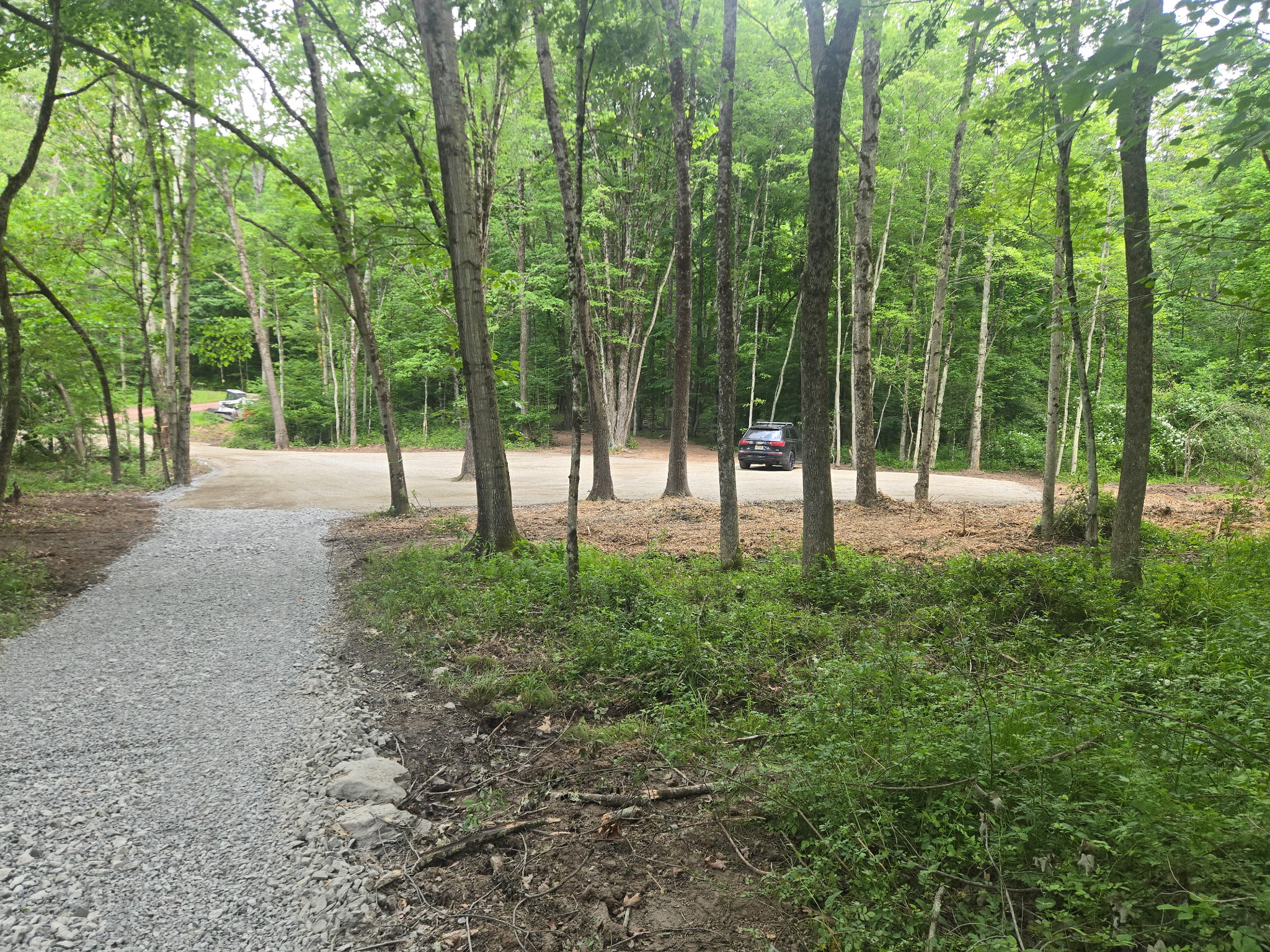 A park-like atmosphere with mature hardwood trees and easy drive-up access to all campsites. 