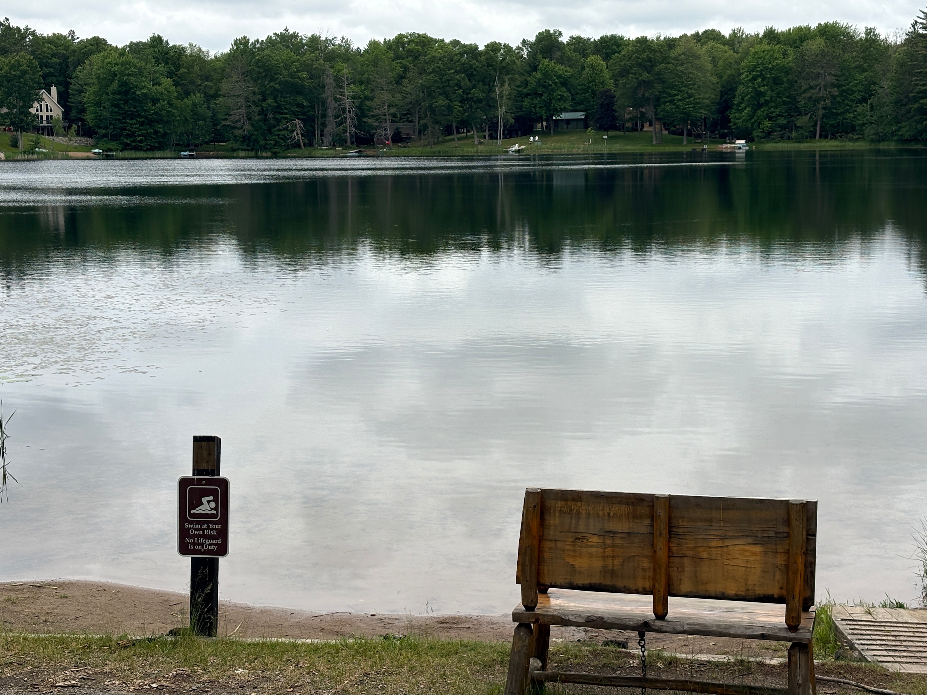 Public sandy swim beach located at N15218 Dolan Lake Rd. Athelstane, WI