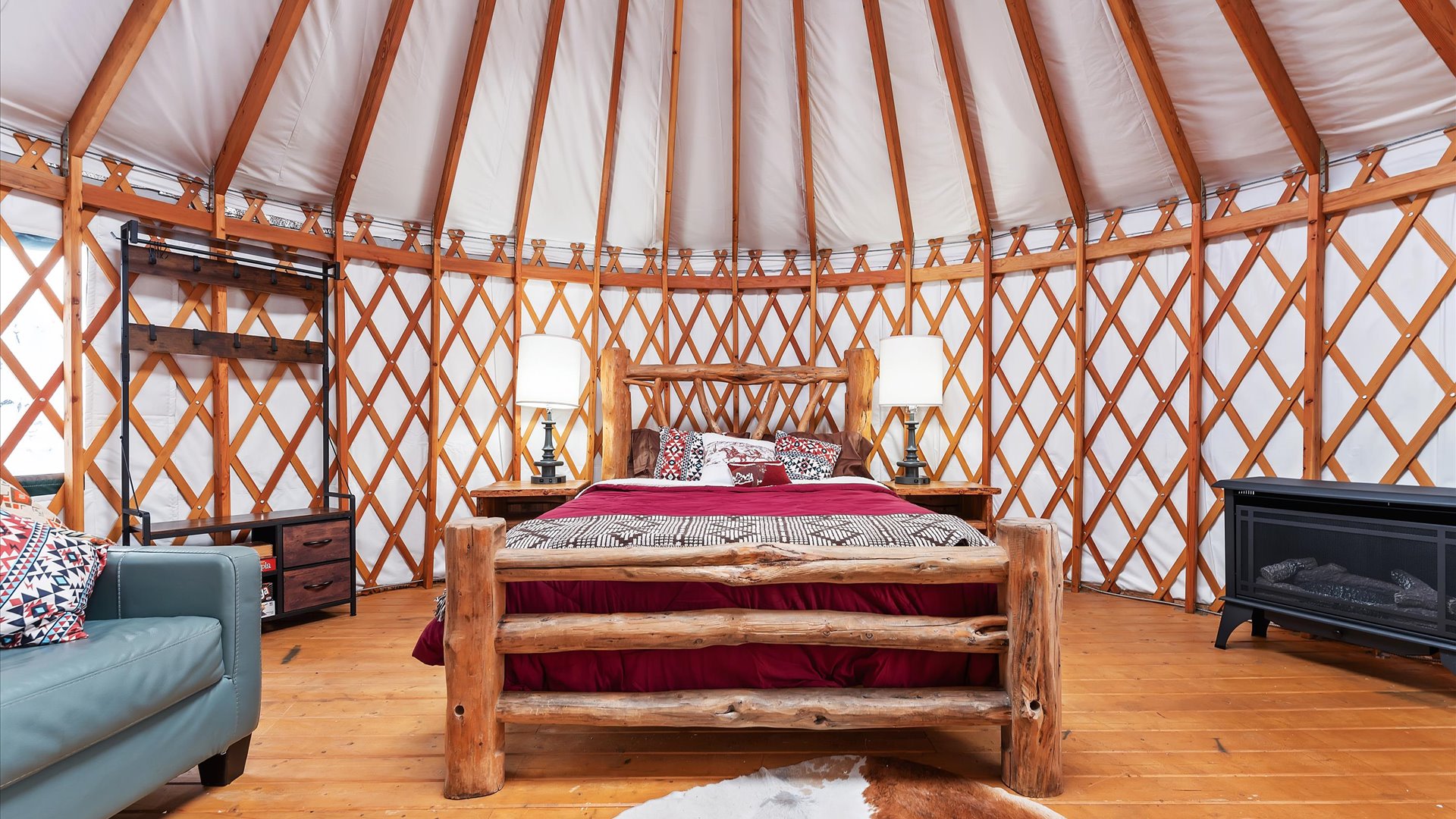 Gold Miner yurt bed, pullout sofa and stove.