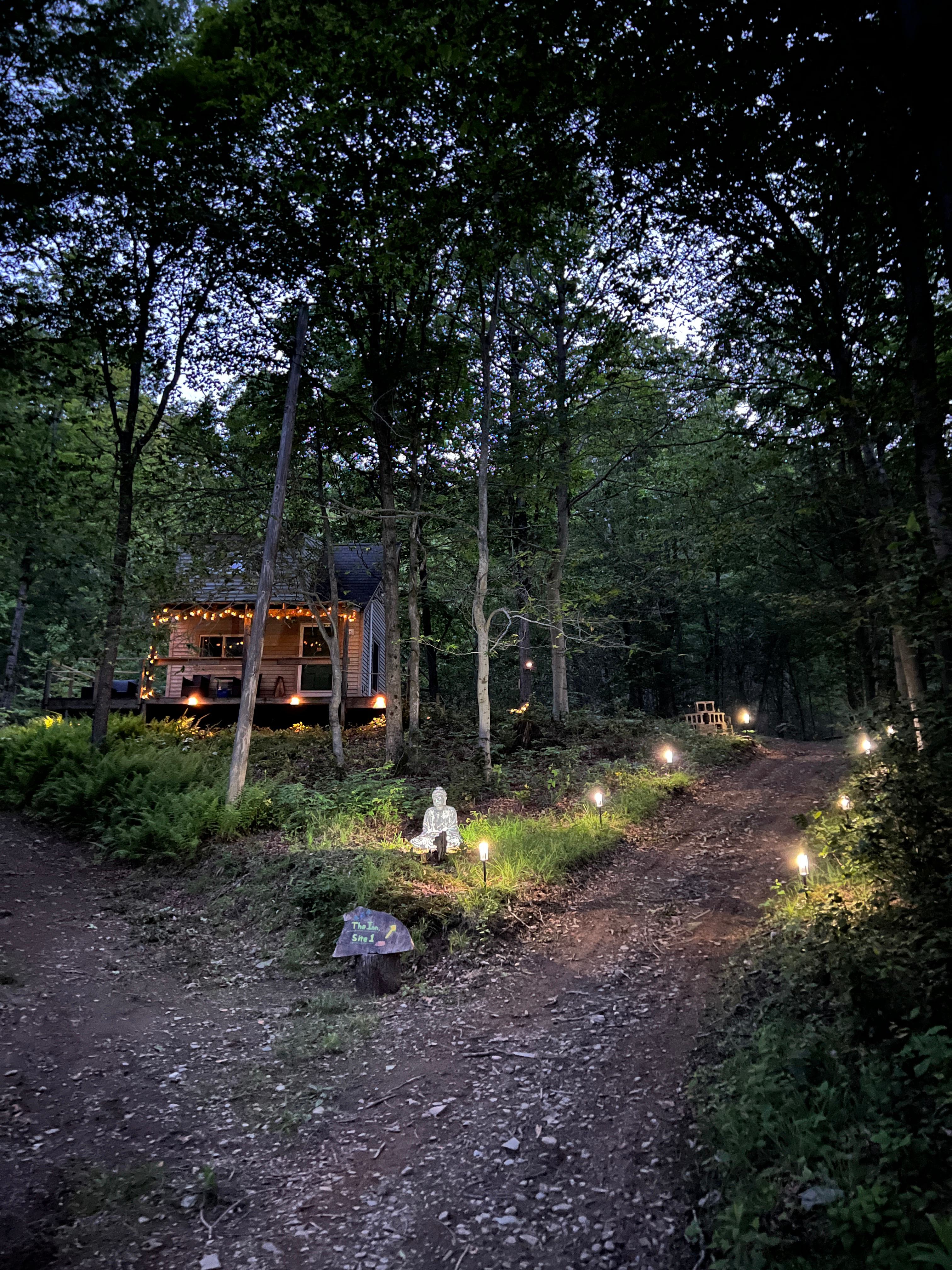 View of the guest cottage and path to site #1 and some trails!