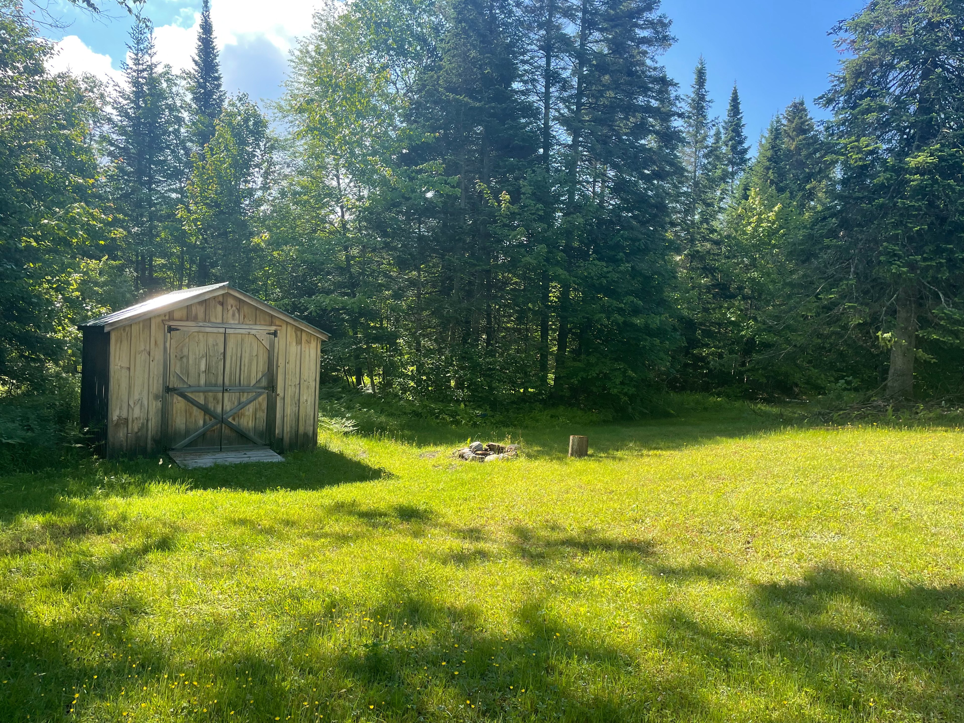 Camper in the woods near swimming