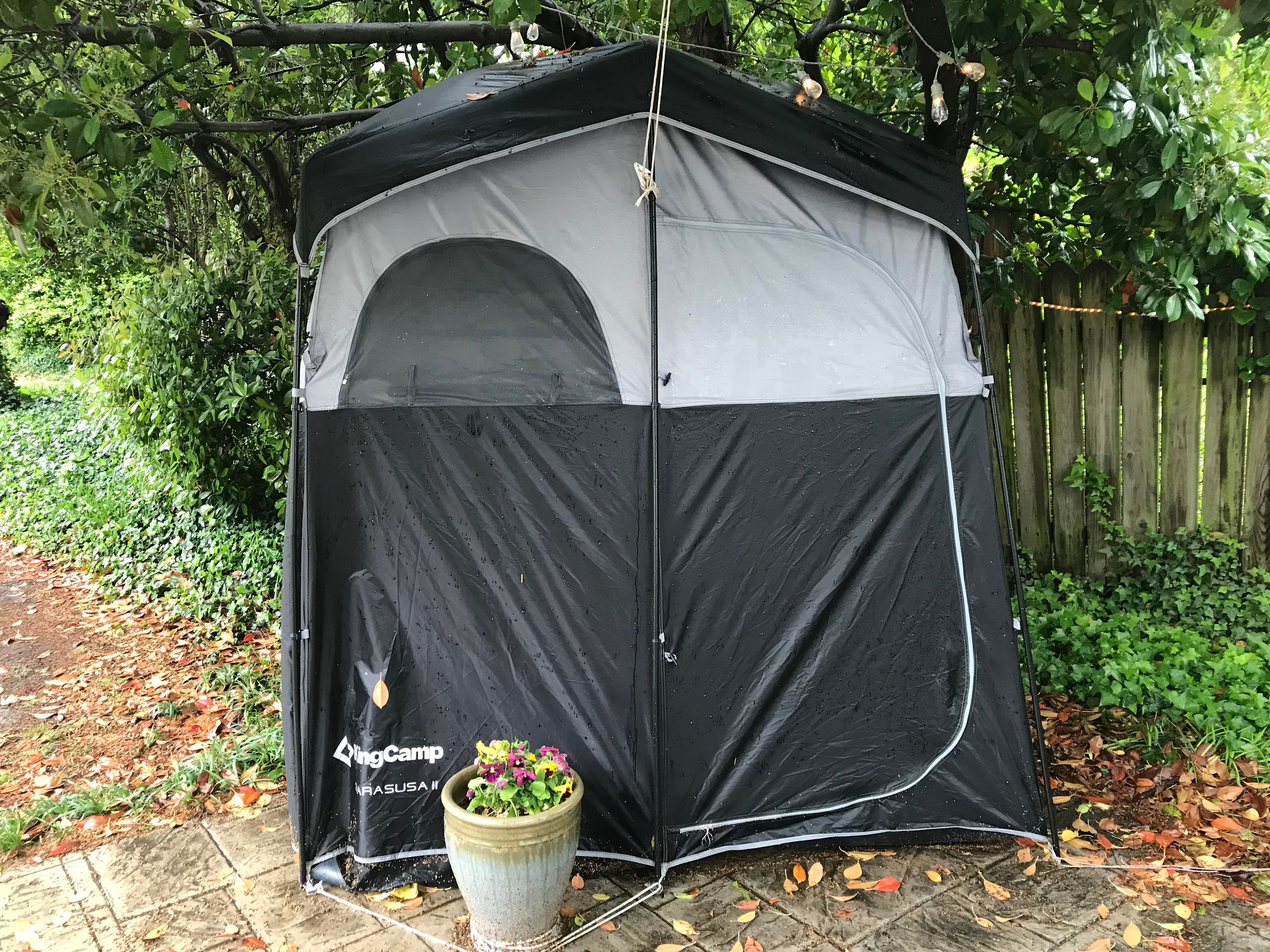 Outside of bathroom tent. Just a few steps from the tent. 