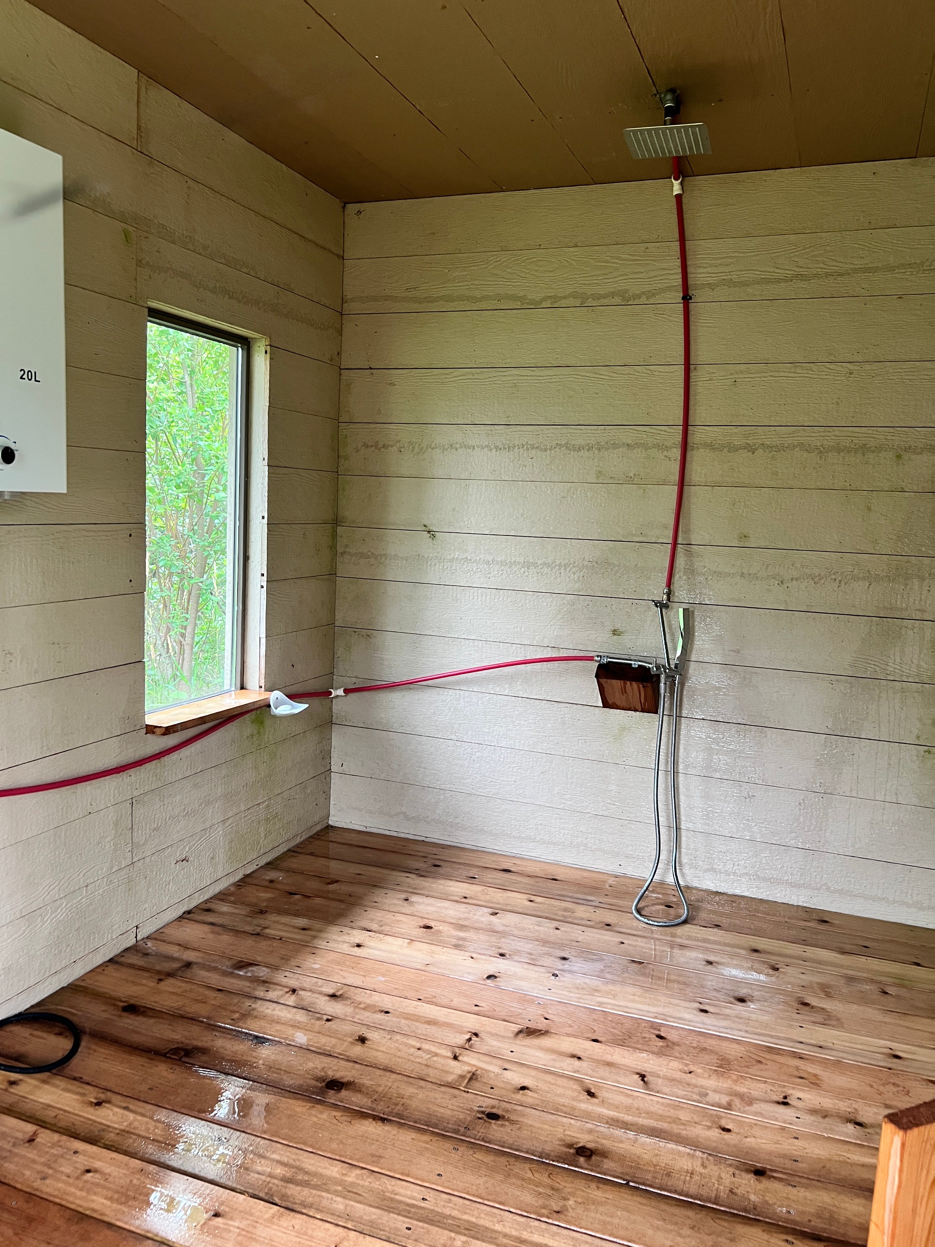 Natural spring shower house