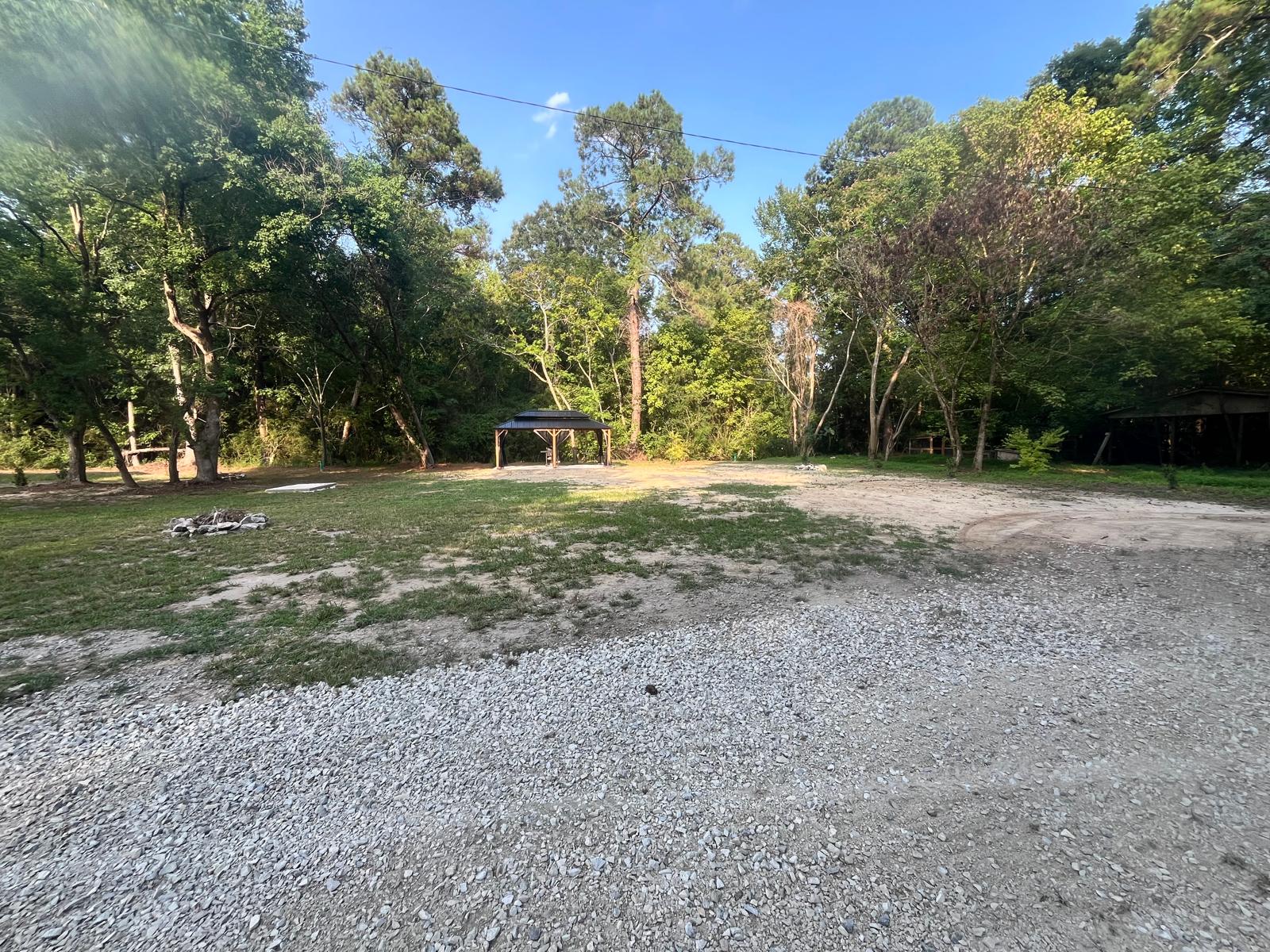 Camping area. All three sites are in this area. The outdoor living space is pictured in the center. 