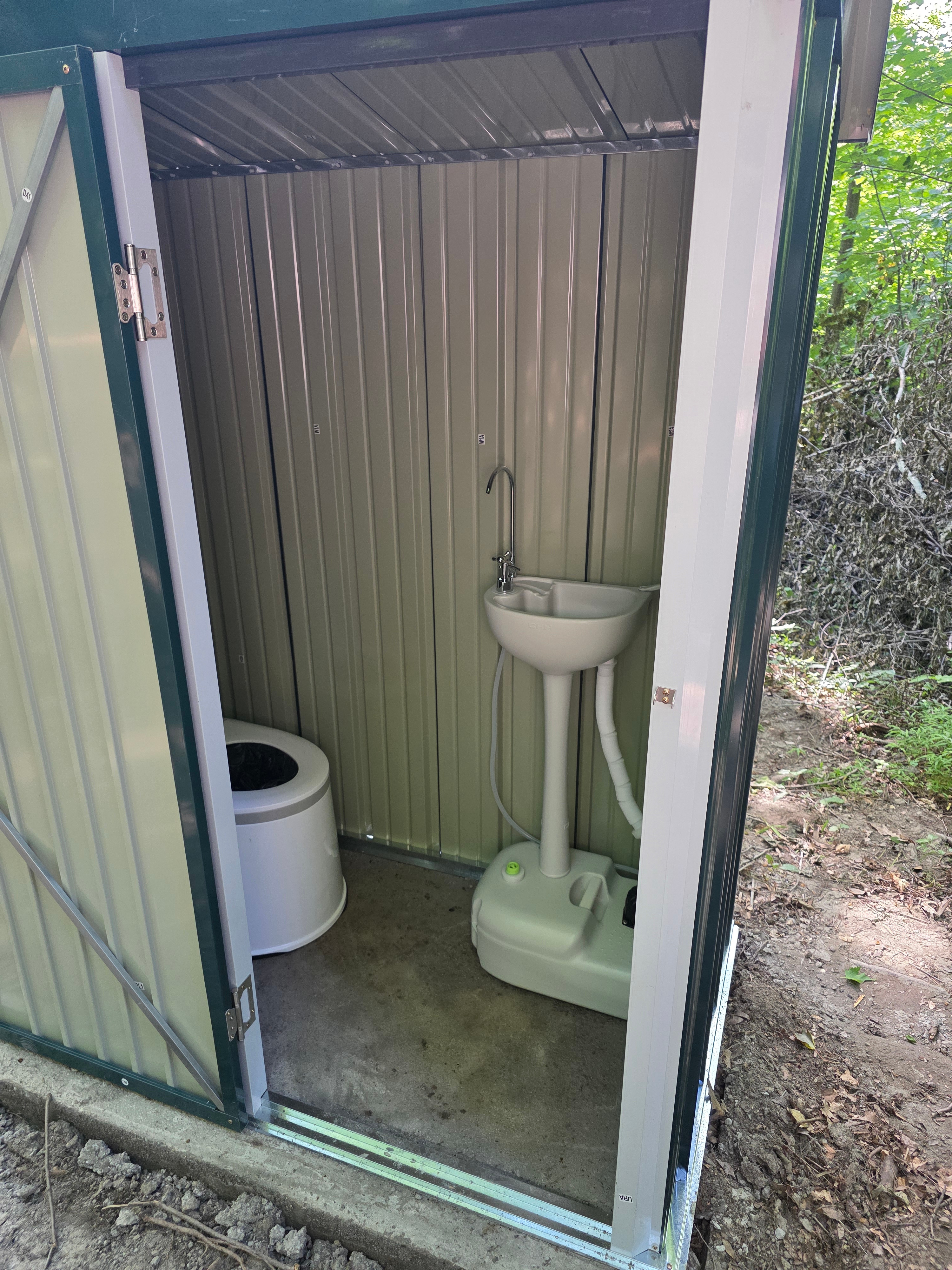 Inside each:  toilets & hand washing sinks