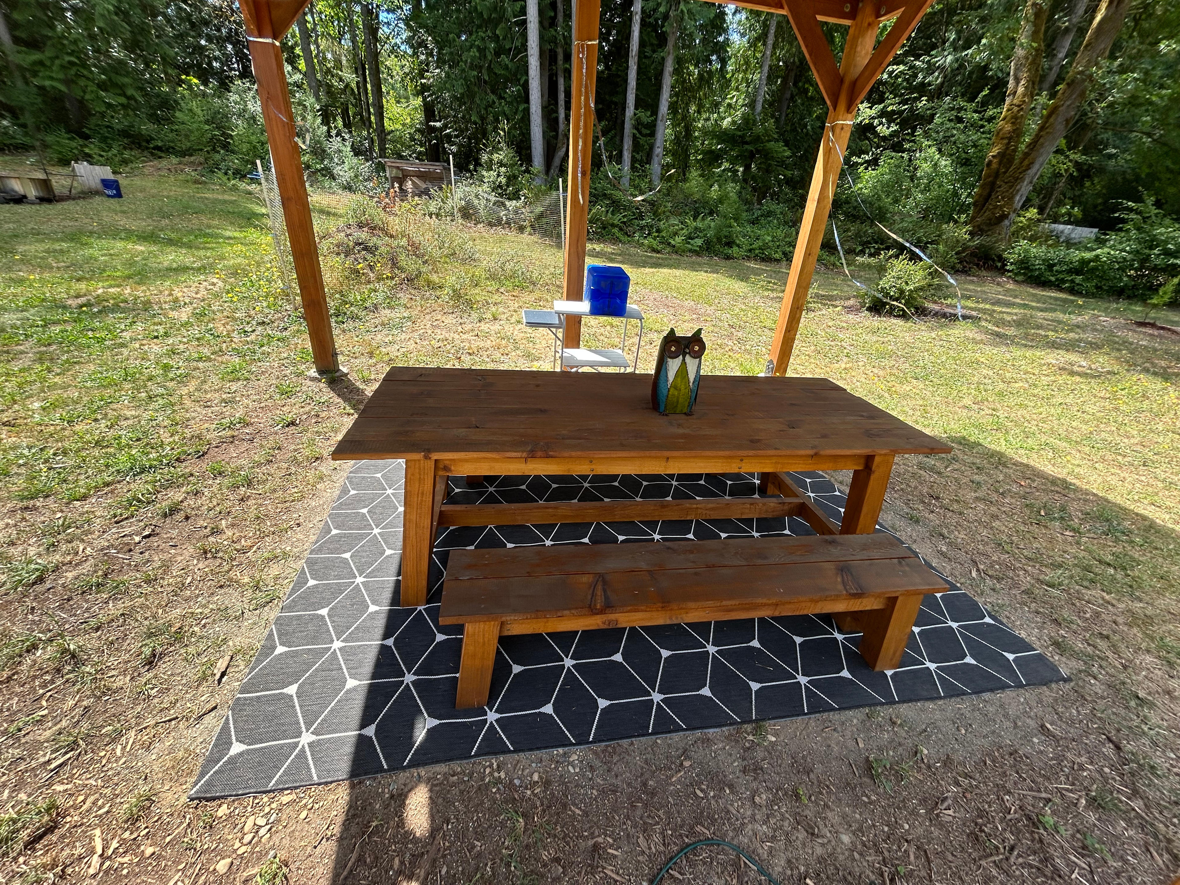 Common area farm table made with wood from the property.