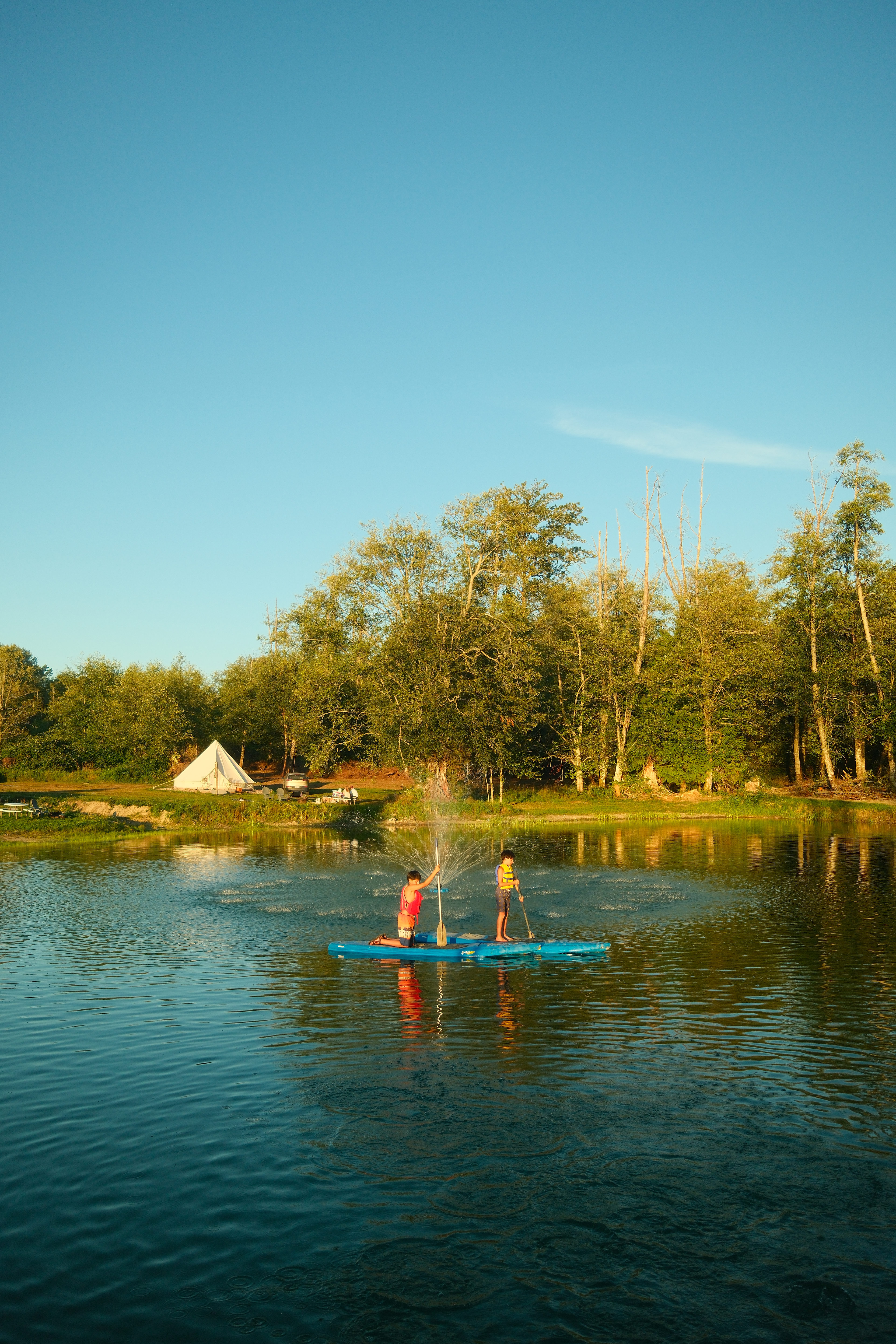 paddle boarding on the pond 