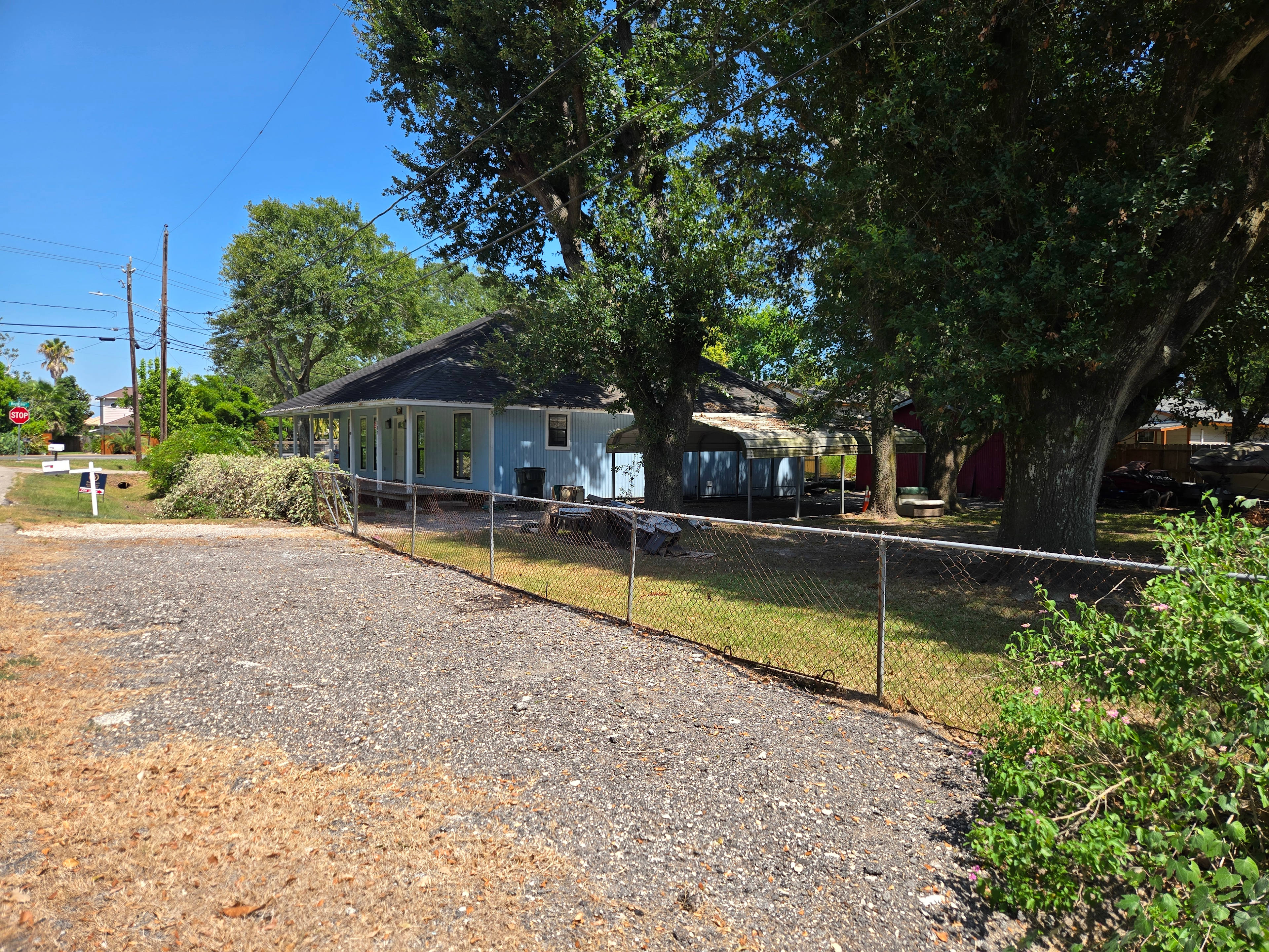 Front and side of house, side yard

