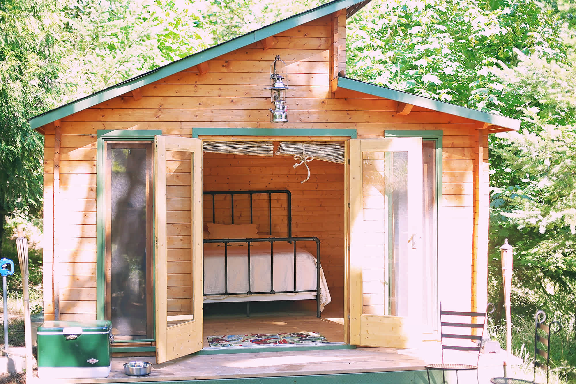 The quaint cabin that rests in 20 acres of beautiful lush property
