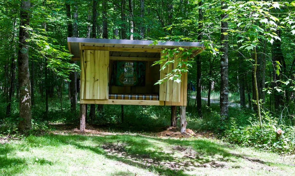 The Cozy Camping Cottage has it's own yard 